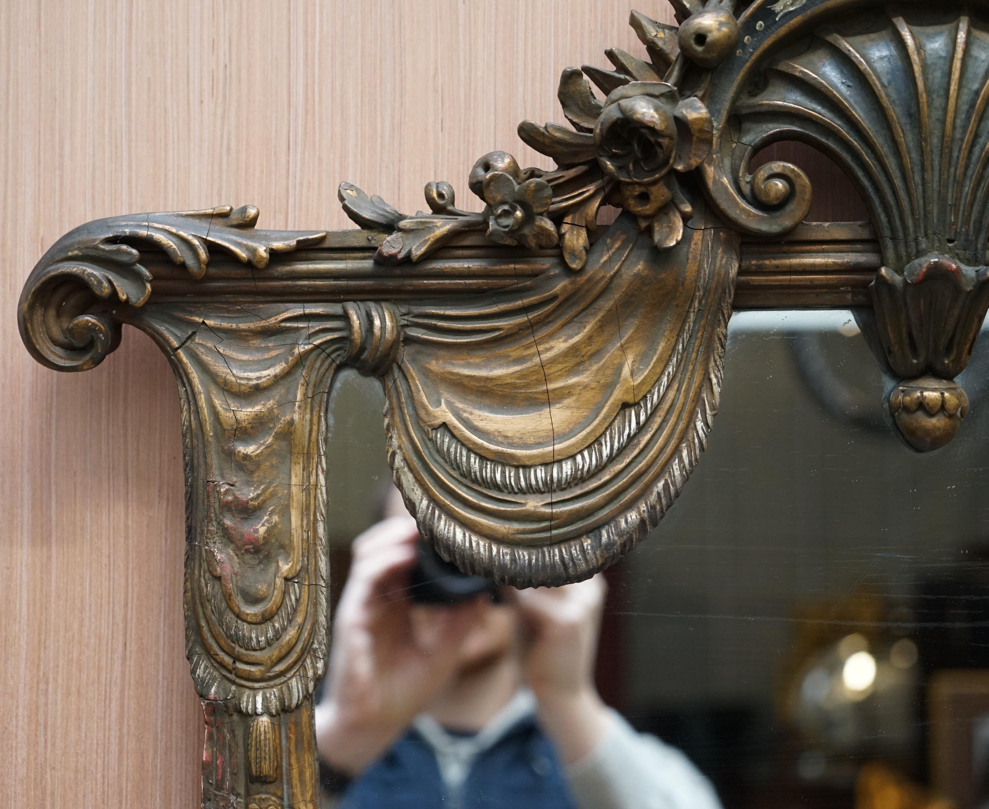 Victorian Rare Large Late 19th Century Giltwood Mirror French Shield Shape Acanthus Detail For Sale