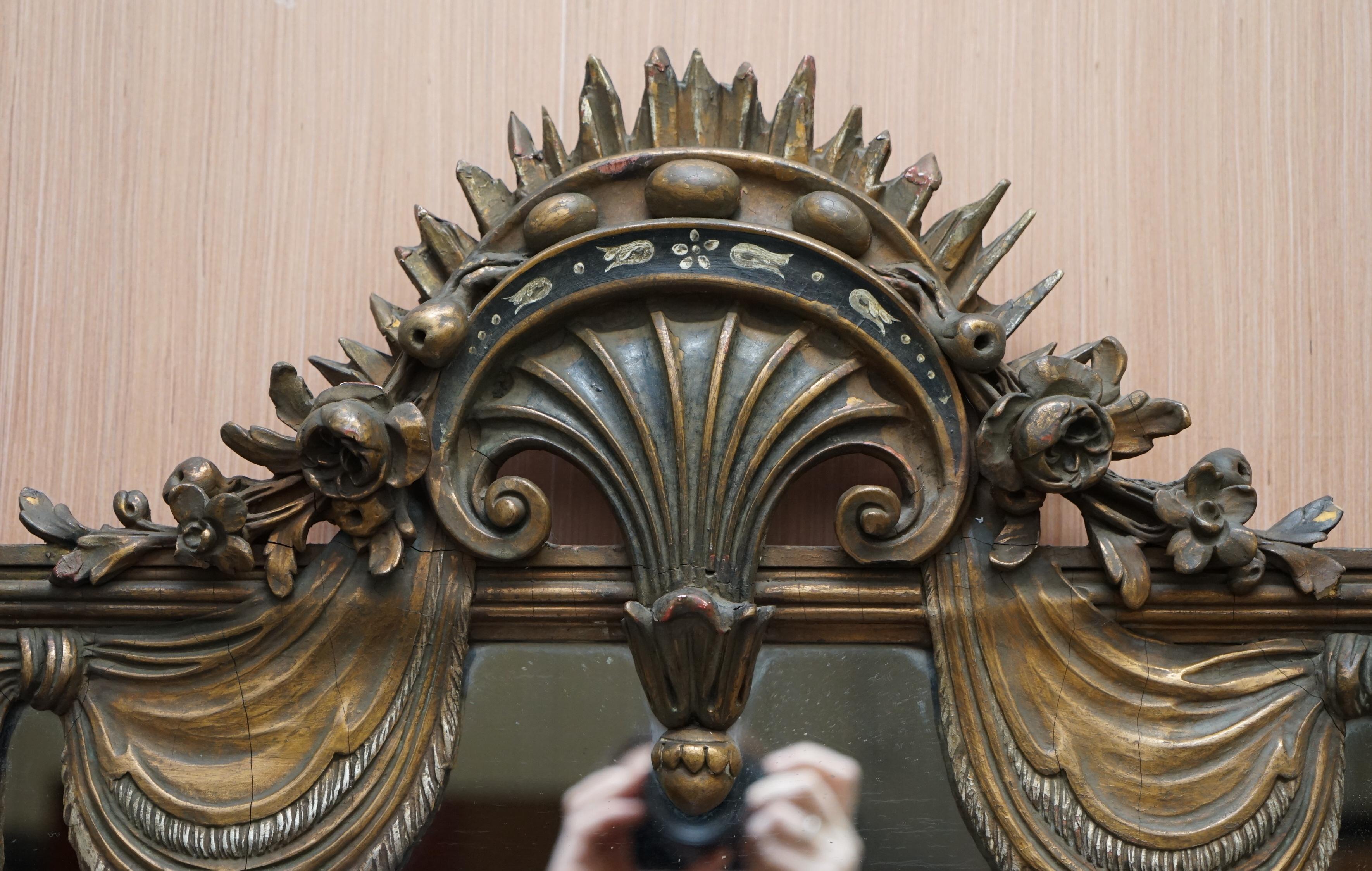 Hand-Crafted Rare Large Late 19th Century Giltwood Mirror French Shield Shape Acanthus Detail For Sale