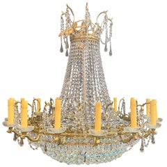 Grand lustre en bronze et cristal de style Empire Louis XVI du 19e siècle