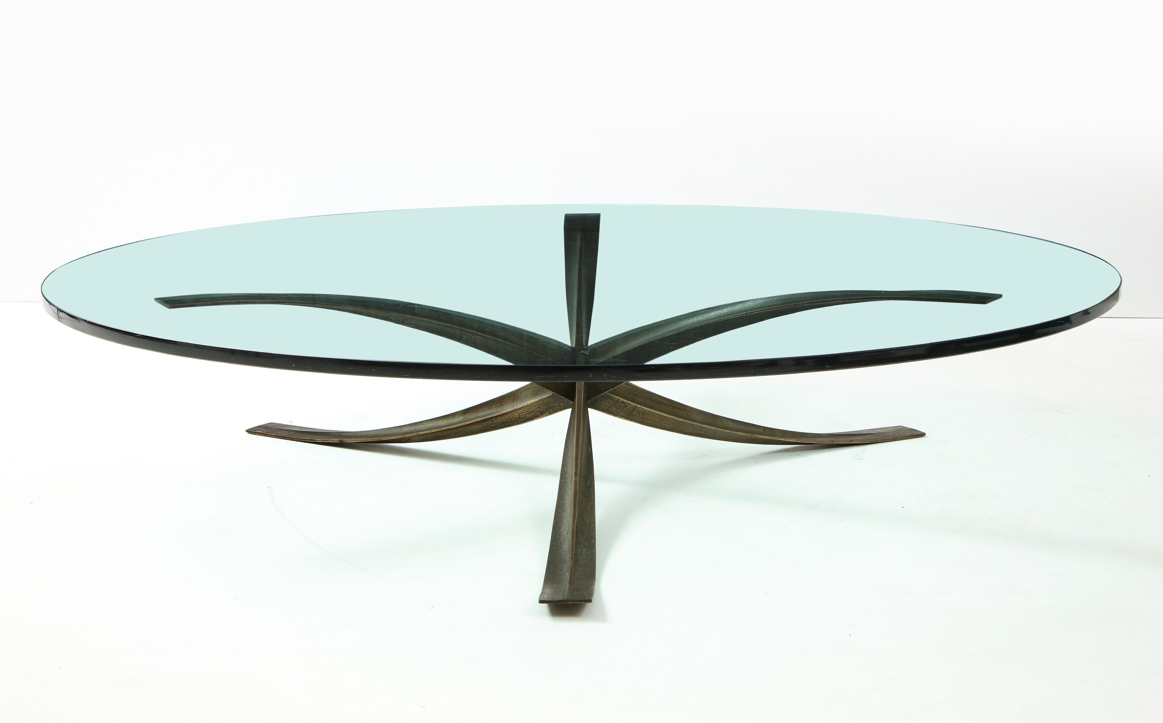 The largest version on Michel Mangematin’s iconic bronze spider table . The base measures 49” wide and 13” high with a 60” thick glass top. Custom made for an American client in 1962.
Biography:
Michel Mangematin was a French designer and architect