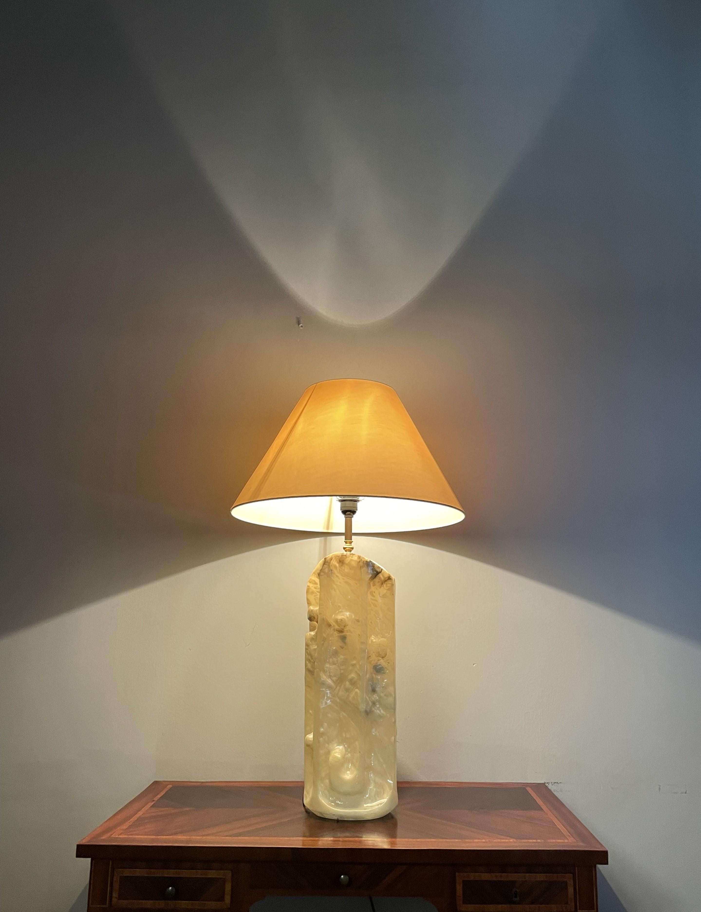 Unique and superb condition, 1950s table lamp.

Both with the light switched on and off, this unique, superbly hand-carved and highly stylish midcentury table or floor lamp is a real stunner. We have said it many times before and even though many of