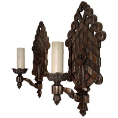 Raro par de grandes candelabros de hierro fundido de los años 20