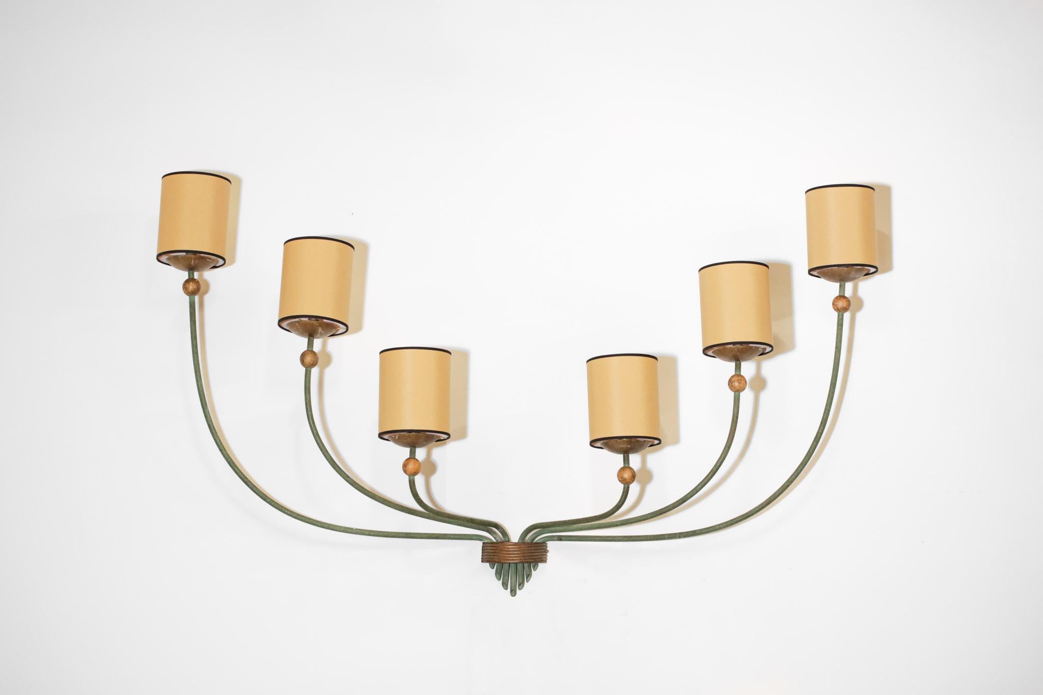 Imposing pair of Art Deco sconces from the 30's in the style of Jean Royère's work. Structure of the sconces in green lacquered metal and brass (for the cups and the central attachment), lampshade refurbished. Beautiful patina of time on the