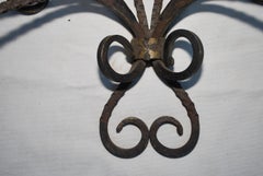 Rare large pair of French wrought iron sconces