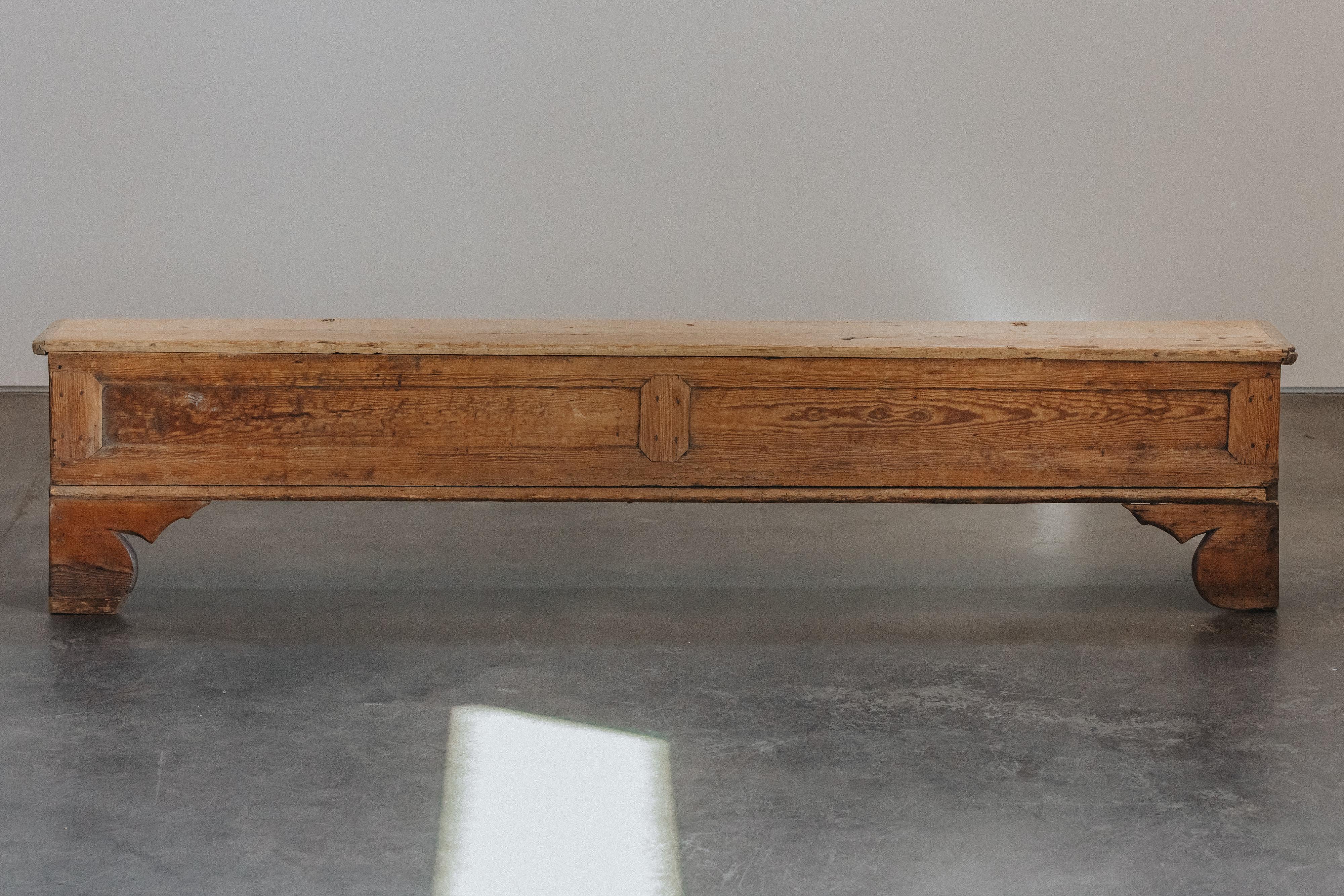 Rare Large Pine Primitive Bench From Norway, Circa 1750.  Nice model with hand carved details and top that opens for storage.  Nice patina and use.