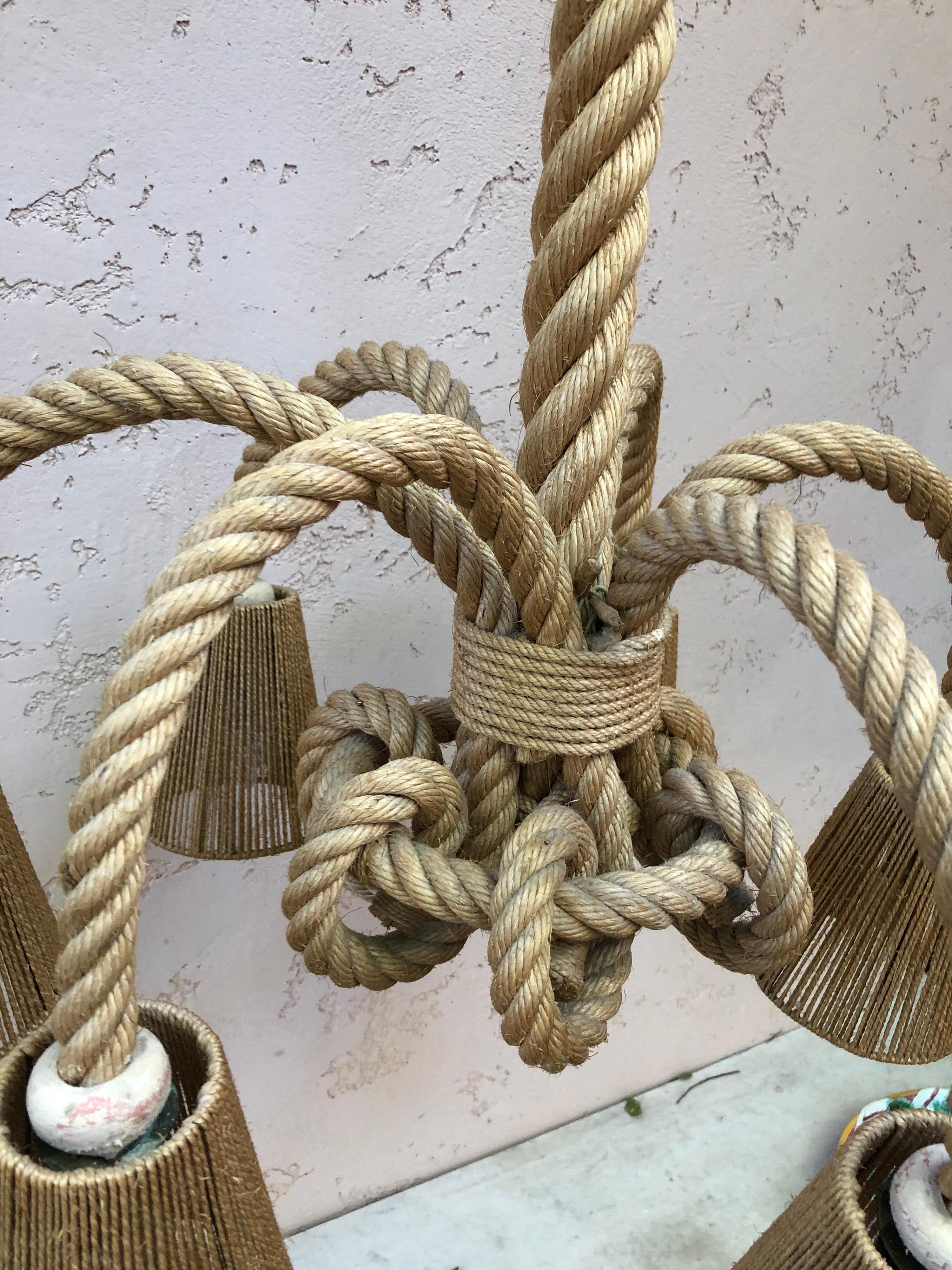 Large exceptional 6 arms rope chandelier Audoux Minet, circa 1960.
Measure: 26 inches diameter.
29 inches height total.
Nautical style.