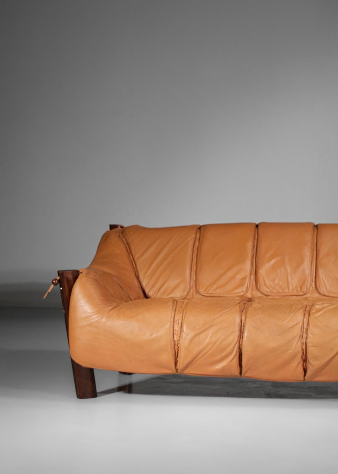 3 seater sofa from the 60's by the famous Brazilian designer Percival Lafer, model MP211. Structure in solid Jacaranda wood, seat in original camel leather. Beautiful model of this sofa in excellent vintage condition with a nice patina of the
