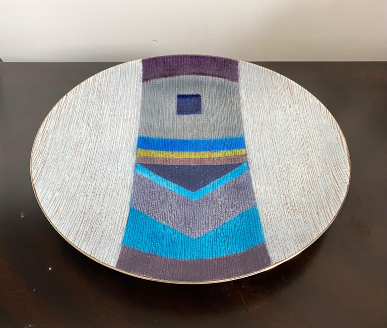 A extra large unique and rare design by the famed Italian artist of Studio Del Campo. The 1980s geometric abstract design is done is shades of blue, purple,gray, and yellow. Signed.
Biography:
Studio Del Campo in Turin, Italy (1957-1998), was a