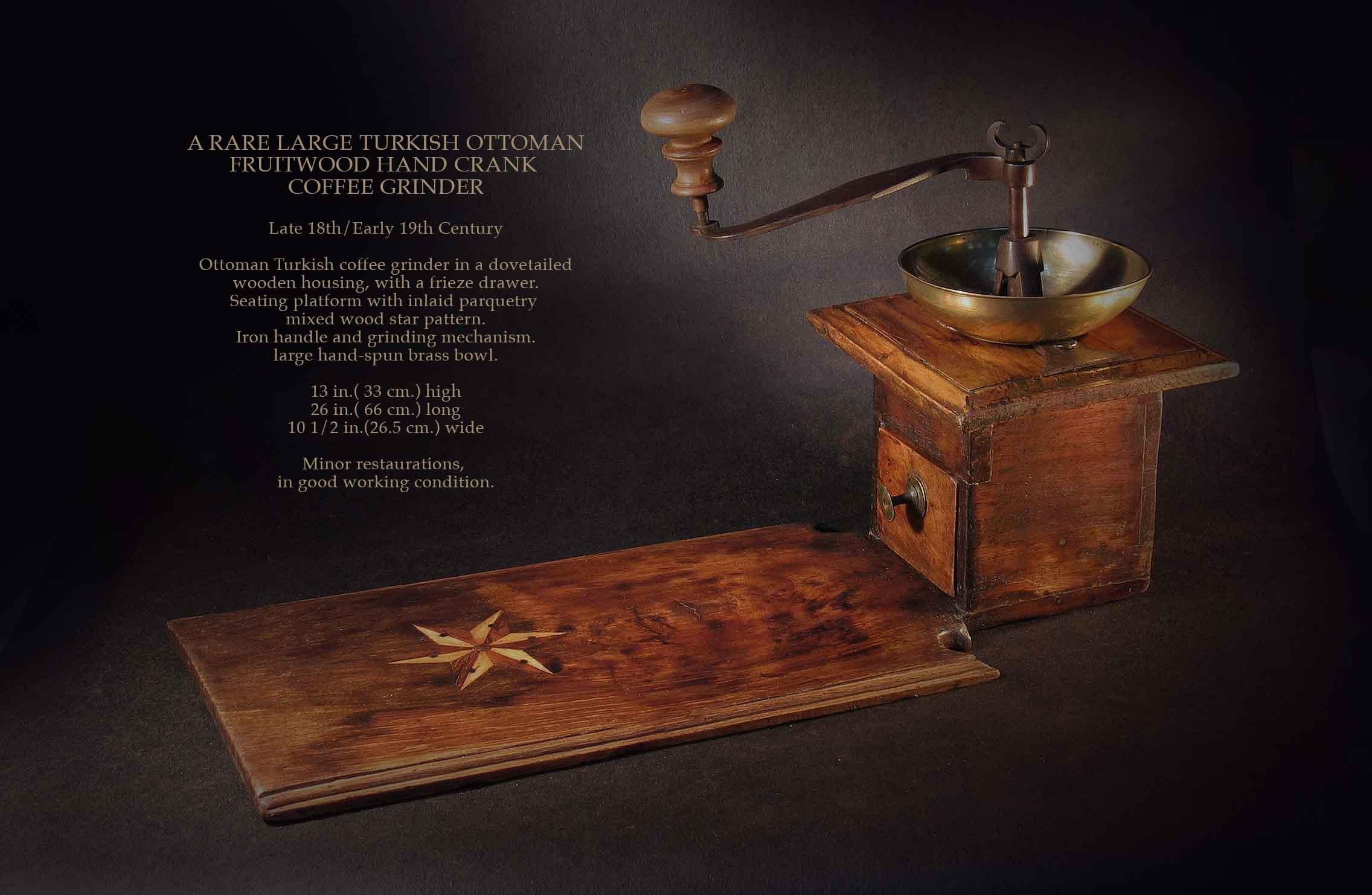 A RARE LARGE TURKISH OTTOMAN
FRUITWOOD HAND CRANK
COFFEE GRINDER

Late 18th/Early 19th Century.

Ottoman Turkish coffee grinder in a dovetailed
wooden housing, with a frieze drawer.
Seating platform with inlaid parquetry
mixed wood star