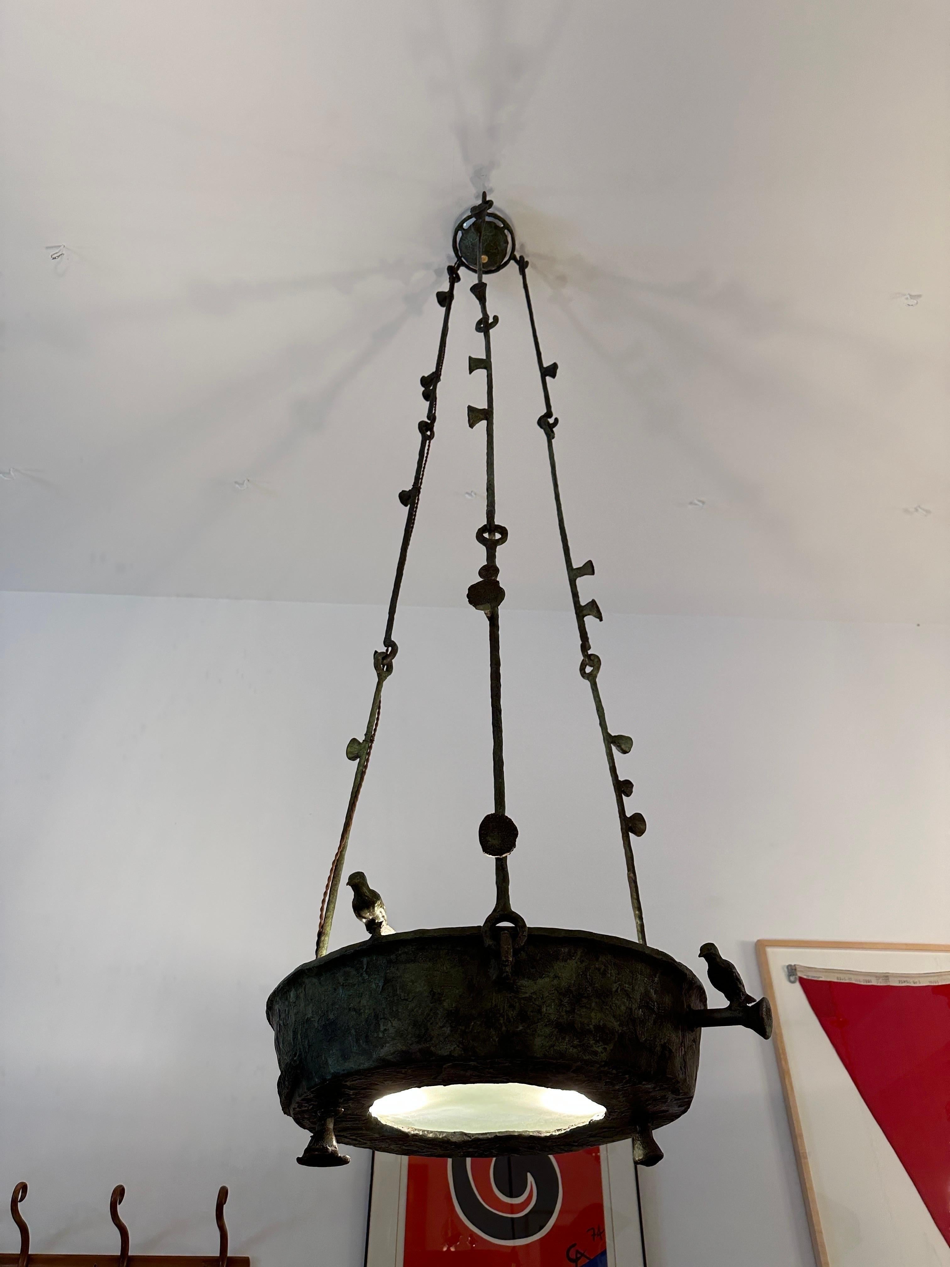 Outstanding verdigris bronze bird bath chandelier by famed Israeli designer, Ilana Goor B. 1936). A monumental three level light fixture, whereas the arms connect and can be shortened for whatever design space you have. This is signed on bronze
