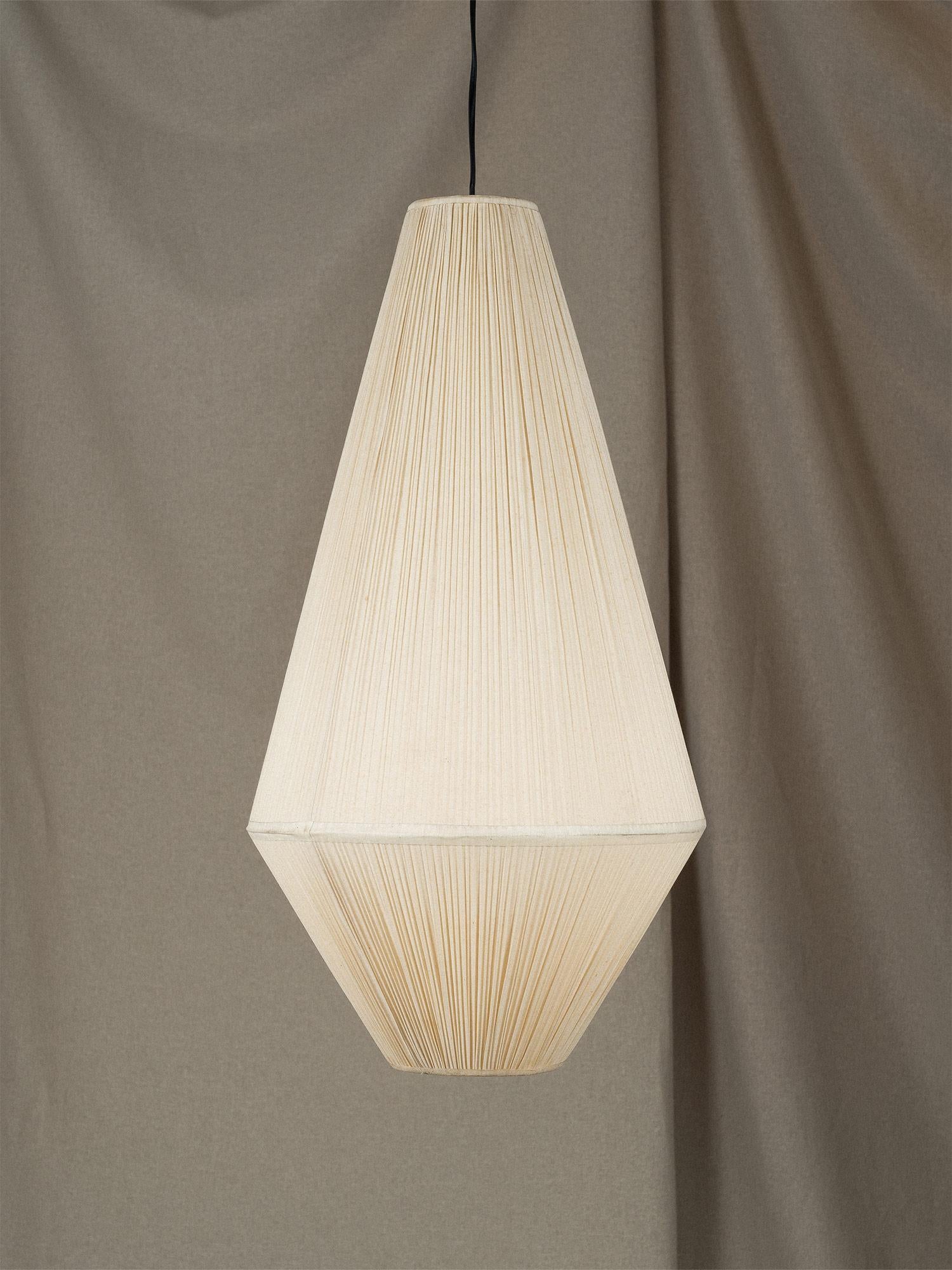 Rare large vintage lamp in a pleaded linen fabric. The lamp has a nice sleek diamond shape design, is lightweight and can be used as a ceiling or floor lamp. Resembling the Akari Light Sculptures by Isamu Noguchi. Inspired by Japanese lanterns.