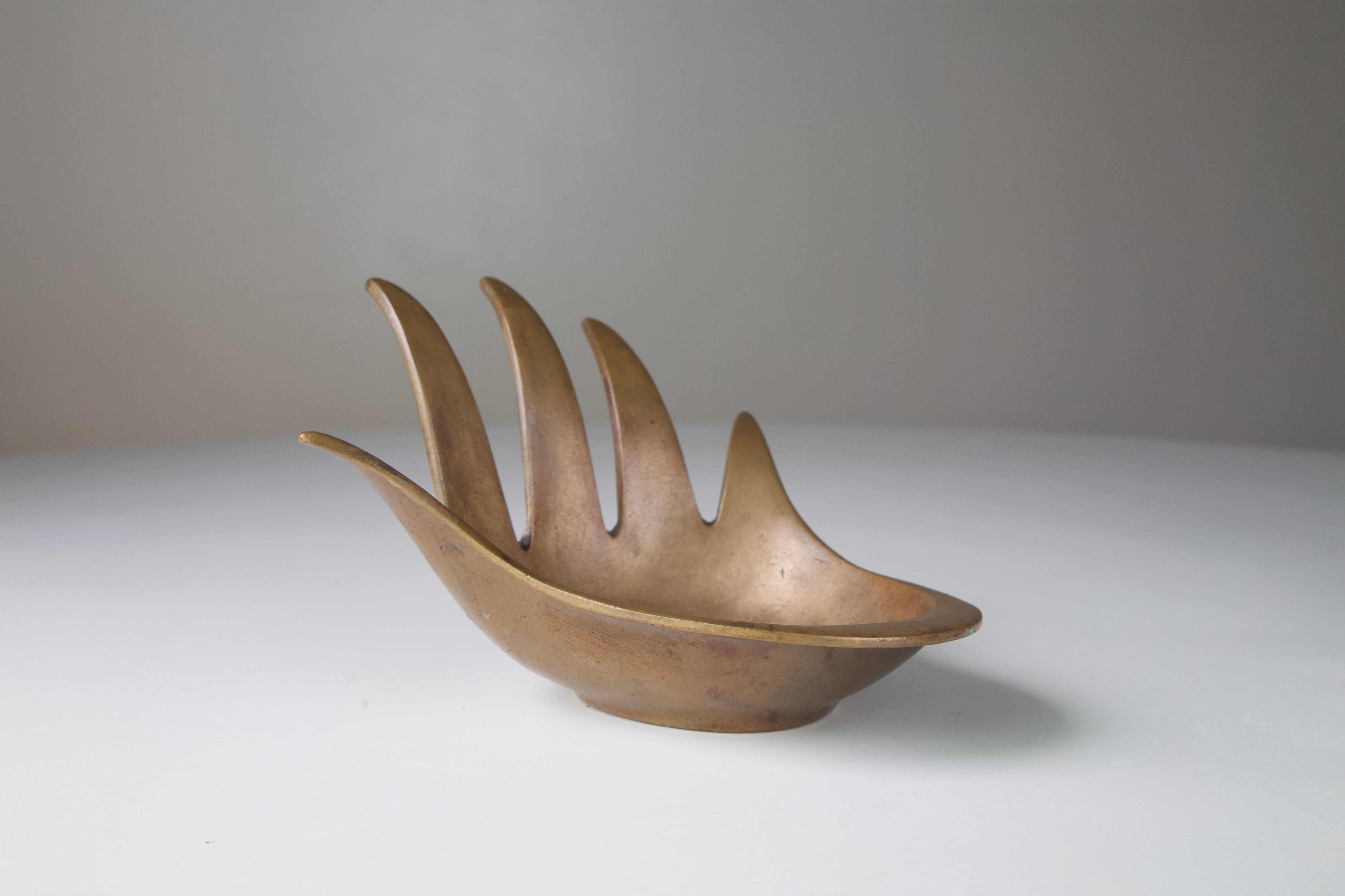 Striking hand-shaped bronze sculptural tray by the Austrian designer Walter Bosse for Herta Balla. This is a rare larger version that is twice the size of the normal version. 