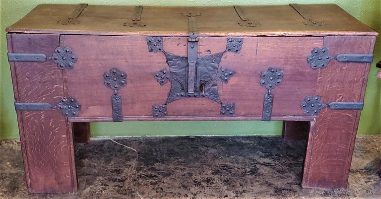 We have the pleasure to present a rare late medieval 16th century German wrought iron oak chest or Stollentruhe.

This is an early 16th century, circa 1500-1550, Stollentruhe or German Gothic chest from most likely Westphalia.

It is made of oak and