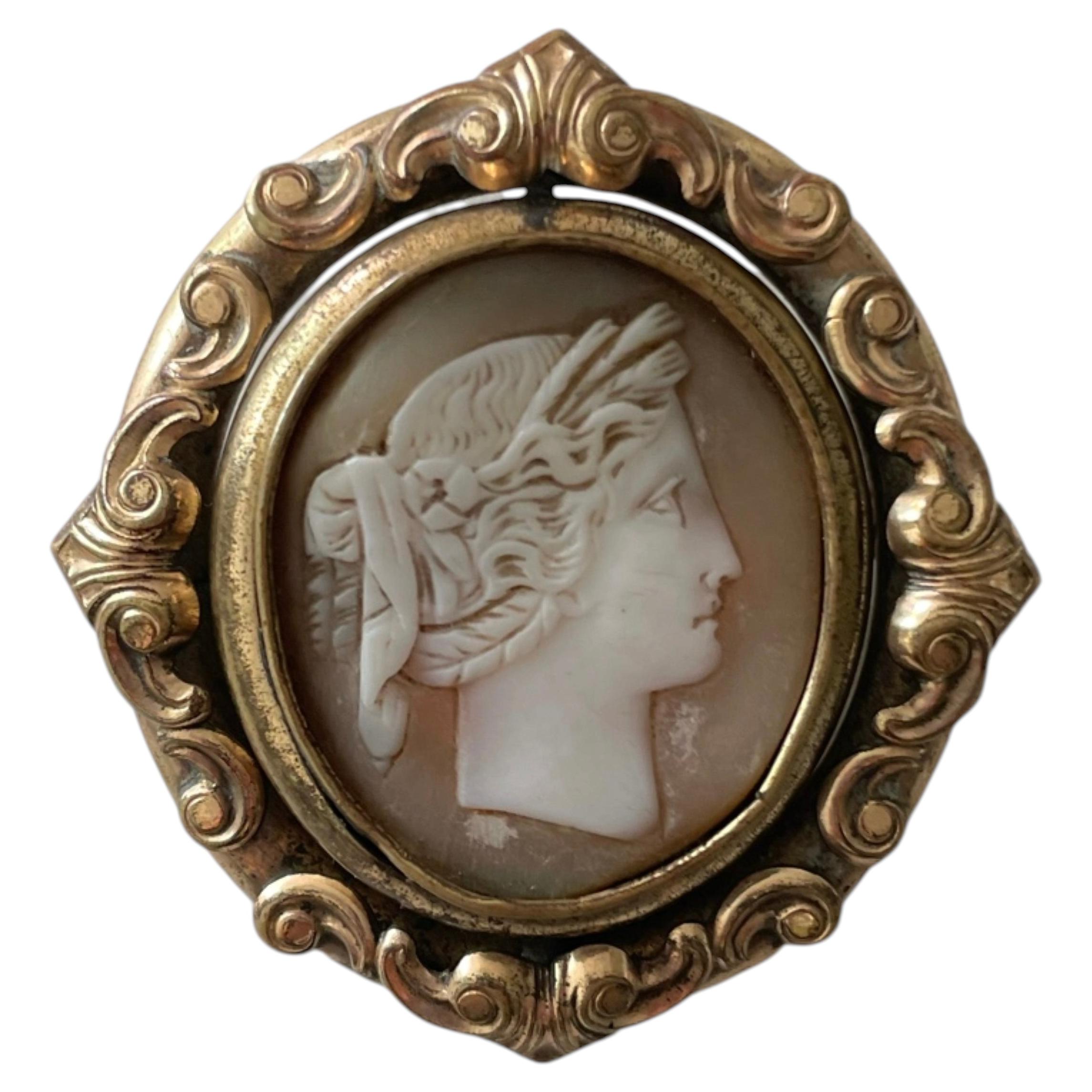 Victorian Shell Cameo and Gold Tone Spinning Locket Brooch, circa 1890