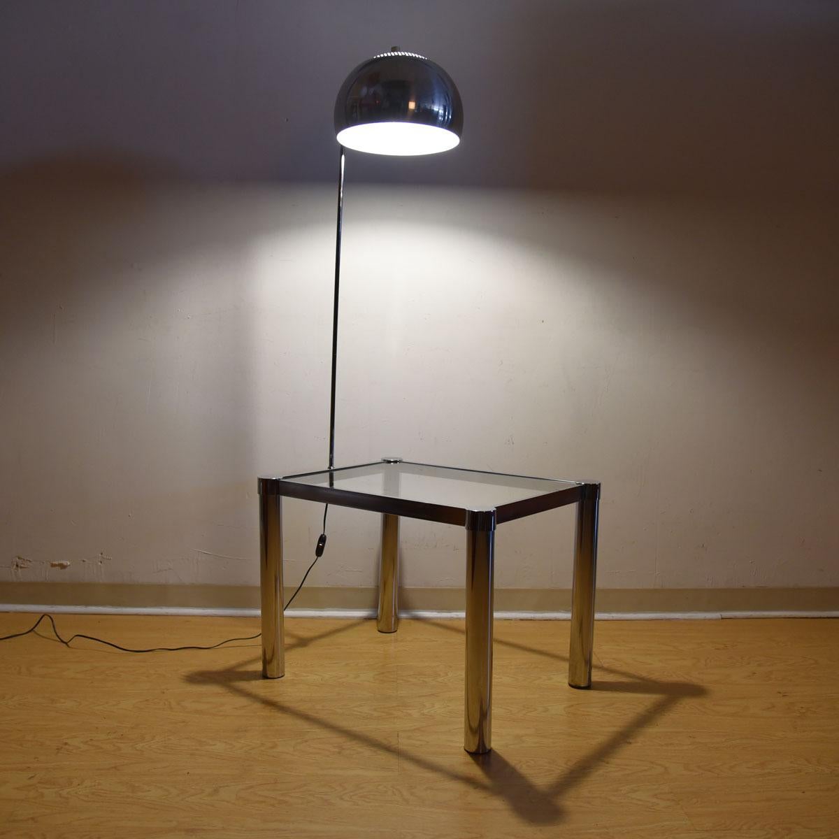 Rare Laurel midcentury Chrome Arc Lamp-Table with Glass Top

Additional information:
Material: Chrome, Glass
We are pleased to present this fabulous chrome table with a glass top. As if that were not enough, a chrome arc lamp is attached,