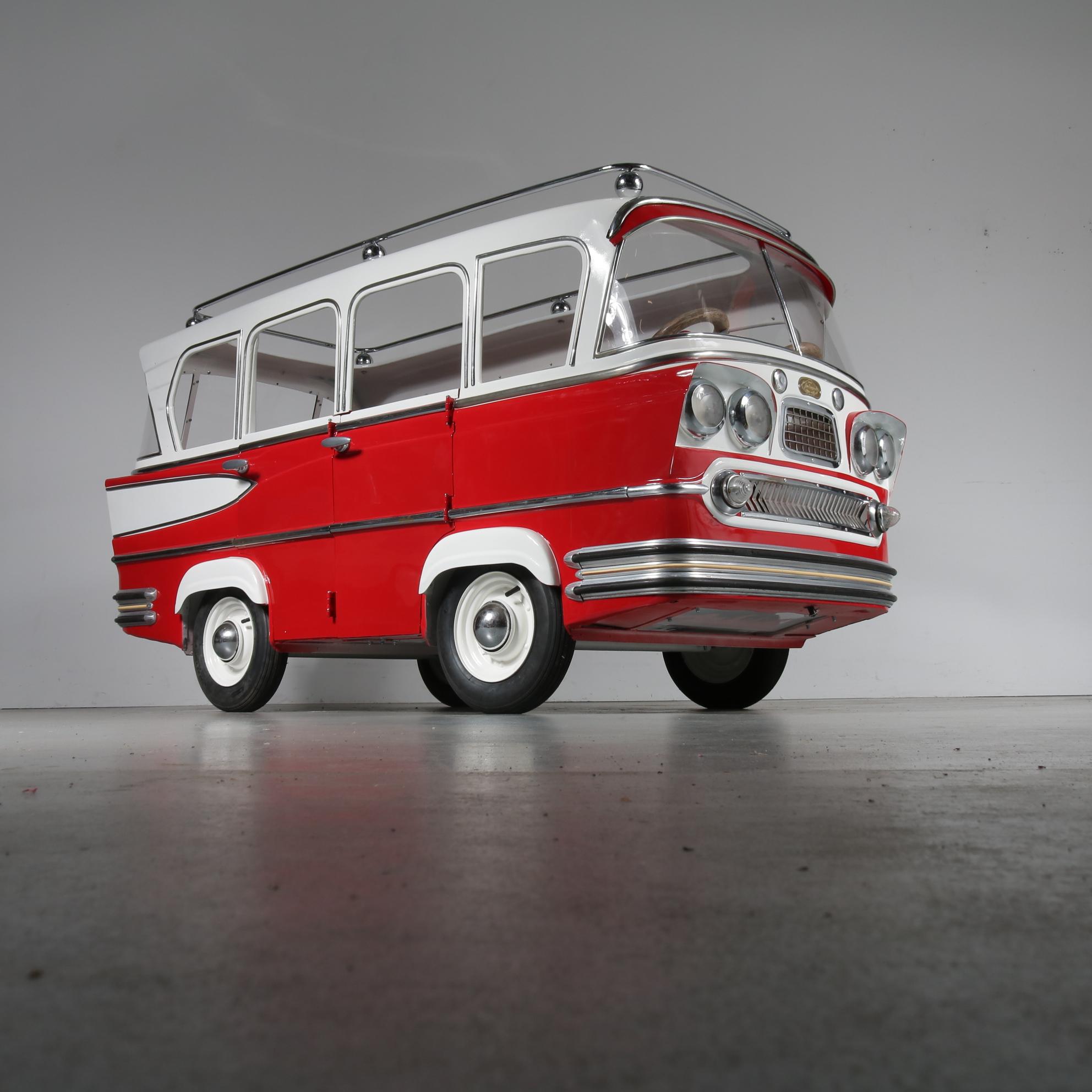 A unique, very rare carousel bus designed by Karel Baeyens, produced by l'Autopede in Ghent, Belgium, circa 1955.

This eye-catching piece has been beautifully renewed after it's original standards. It is made of metal, painted in a beautiful