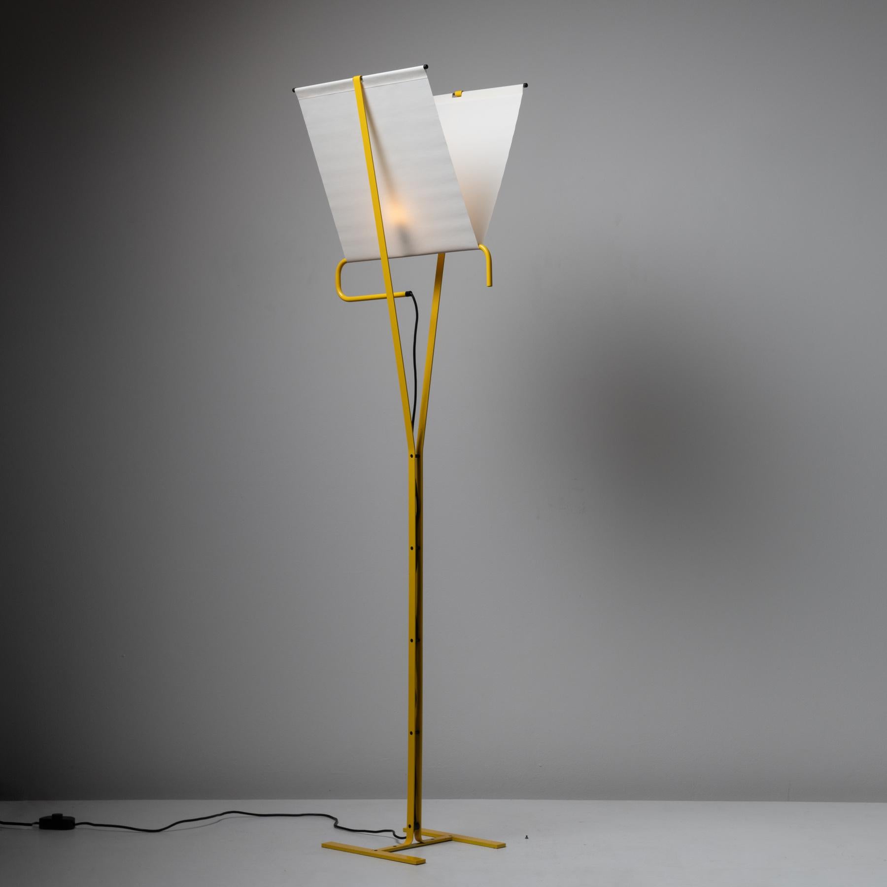 'Le Falene' floor lamp by Piero De Martini for Arteluce. Designed and manufactured in Italy, circa the 1980s. Linen shades are sub-formed onto yellow enameled rod bases. The lamp holds a single E27 socket, adapted for the US. We recommend a single