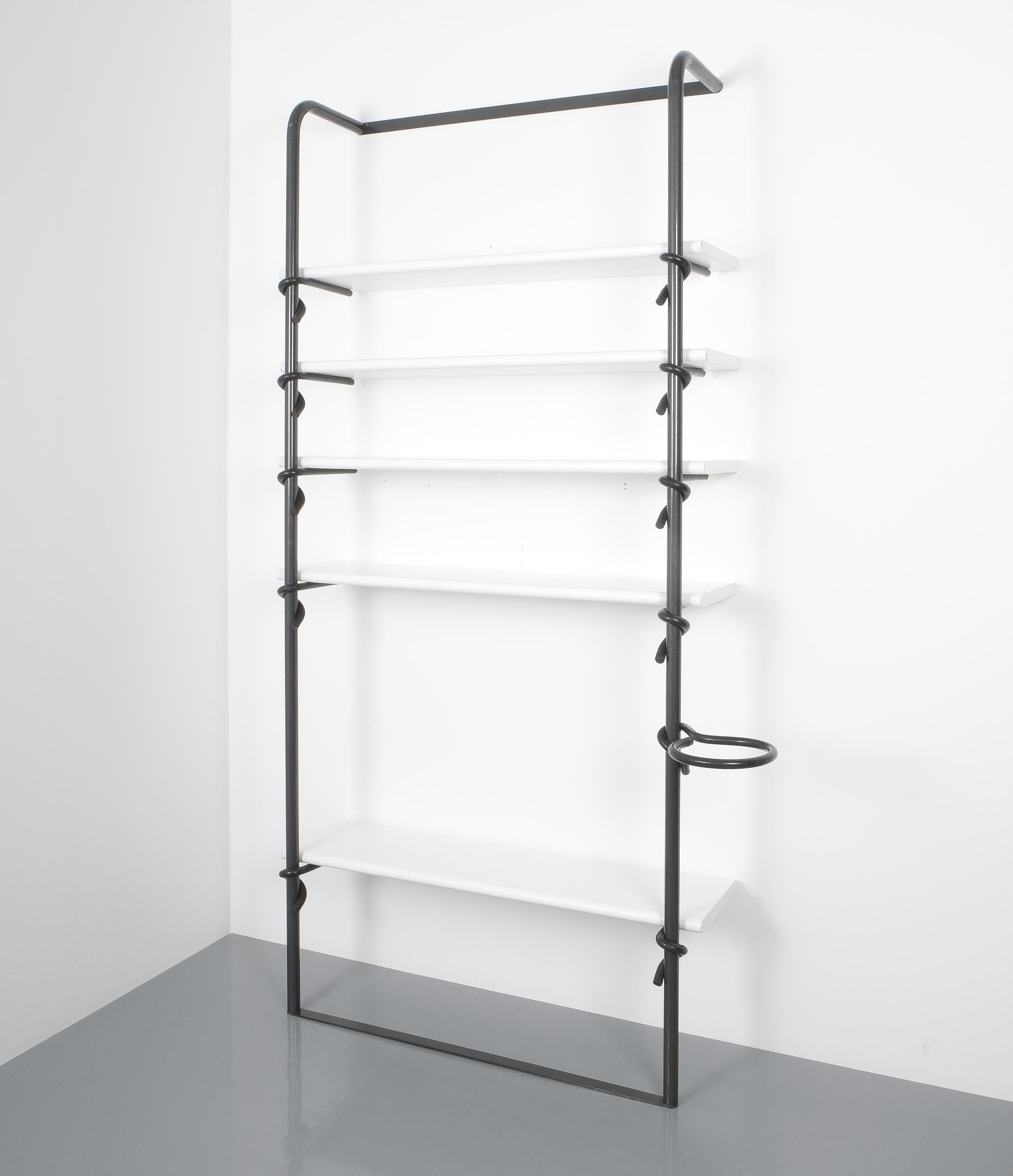 Rare Library shelf system by Luciano Pagani and Angelo Perversi, produced by Joint, Italy, 1987. Shelf system made from black steel and formica covered wood with adjustable rubber coated steel hooks that serve as cantilevers for the shelf boards.