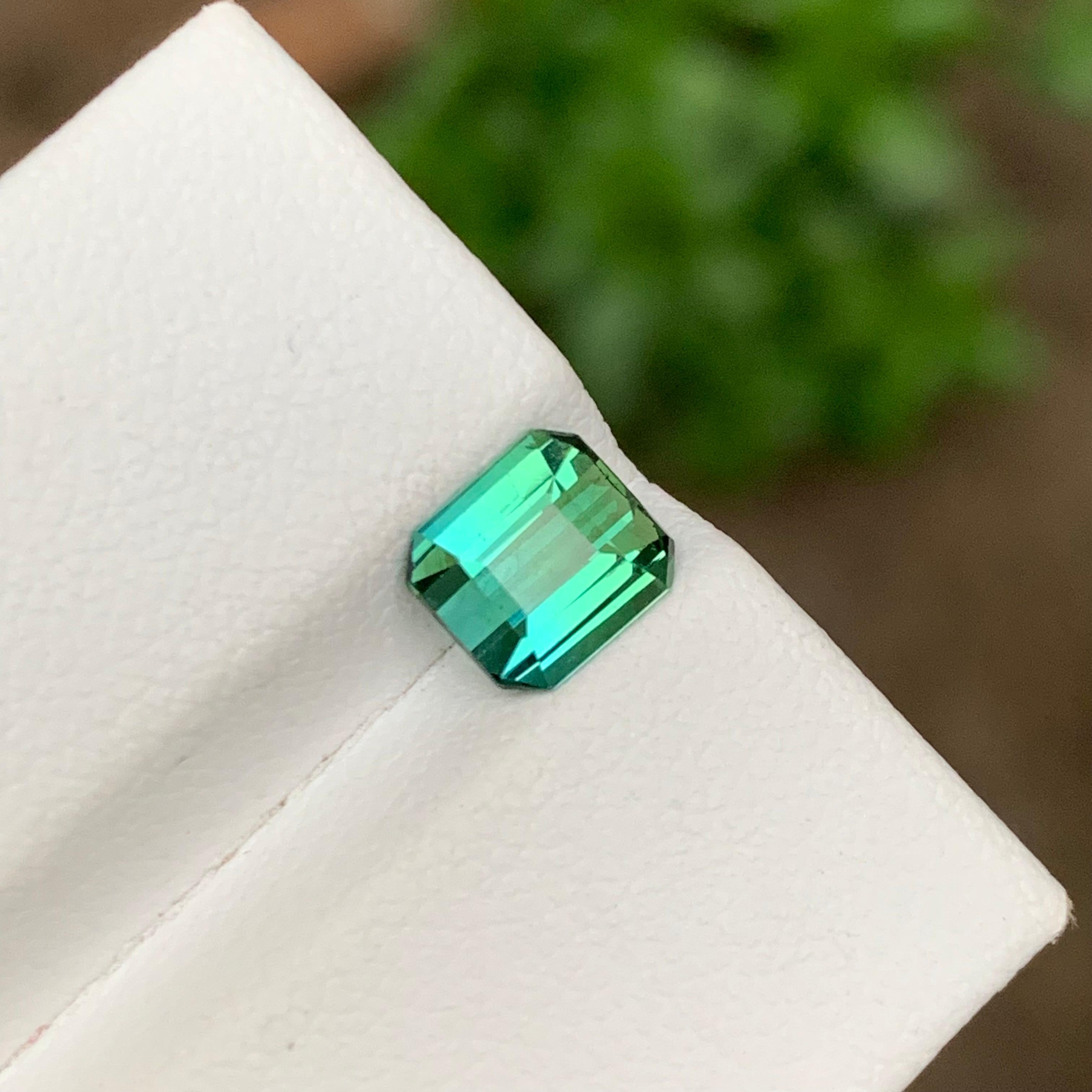 GEMSTONE TYPE: Tourmaline
PIECE(S): 1
WEIGHT: 1.35 Carats
SHAPE: Emerald
SIZE (MM): 6.65 x 6.06 x 3.85
COLOR: Light Blue and Green Two Tone
CLARITY: Approx Eye Clean
TREATMENT: None
ORIGIN: Afghanistan
CERTIFICATE: On demand

Introducing our
