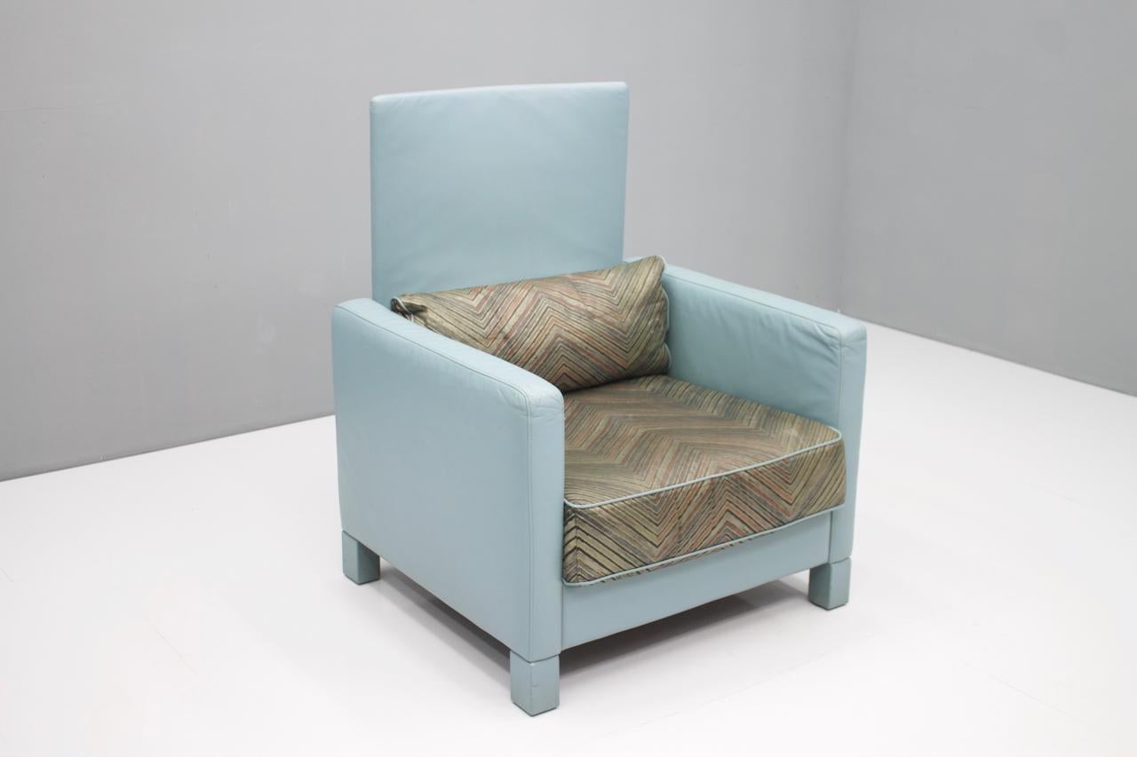 A rare leather lounge chair 'Negeresco' in light blue leather and fabric cushion by Wilhelm Setz for Walter Knoll, 1989.

Good original condition.
Details

Creator: Walter Knoll (Maker)
Period: 1989
Color: blue
Style: Post-Modern
Place of Origin: