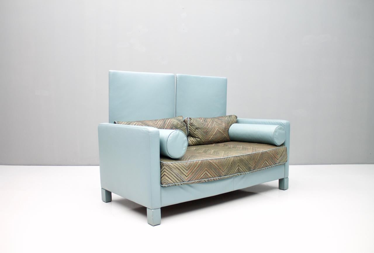 A rare leather lounge sofa 'Negeresco' in light blue leather and fabric cushion by Wilhelm Setz for Walter Knoll, 1989.
Good original condition.
Details

Creator: Walter Knoll (Maker)
Period: 1989
Color: blue
Style: Post-Modern
Place of Origin: