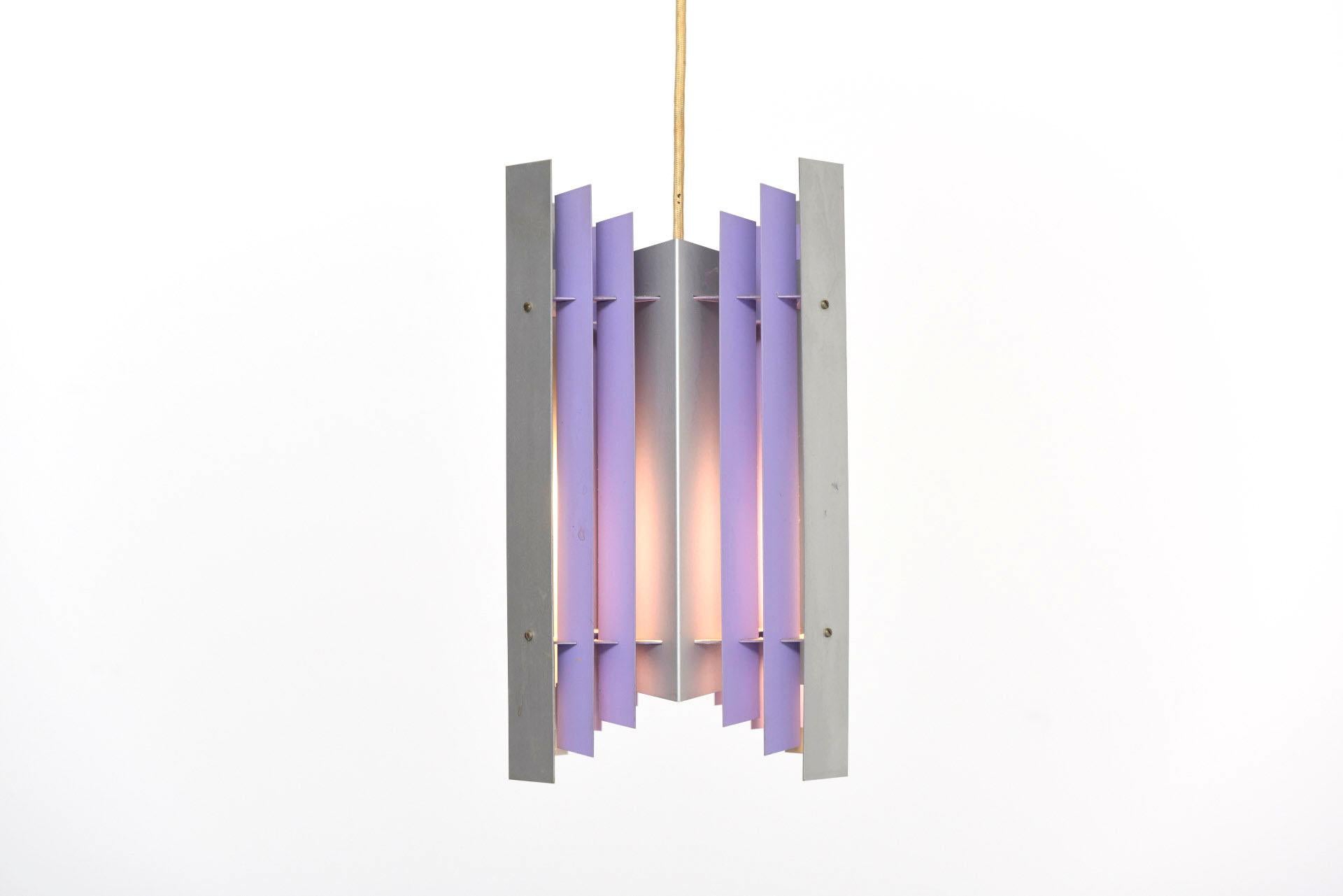Rare lilac pendant designed by Preben Dahl in the 1960s. Brushed and lilac lacquered metal strips. Produced by HF Belysning in Denmark.