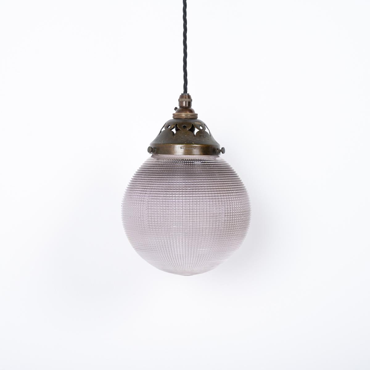 Antique Lilac Tinted Globe Pendant Lights by Holophane

Price is per light.

A beautiful small prismatic glass globe by Holophane.

British made circa 1920. 

The glass has a rare lilac tint giving the light a unique and beautiful finish.

Original