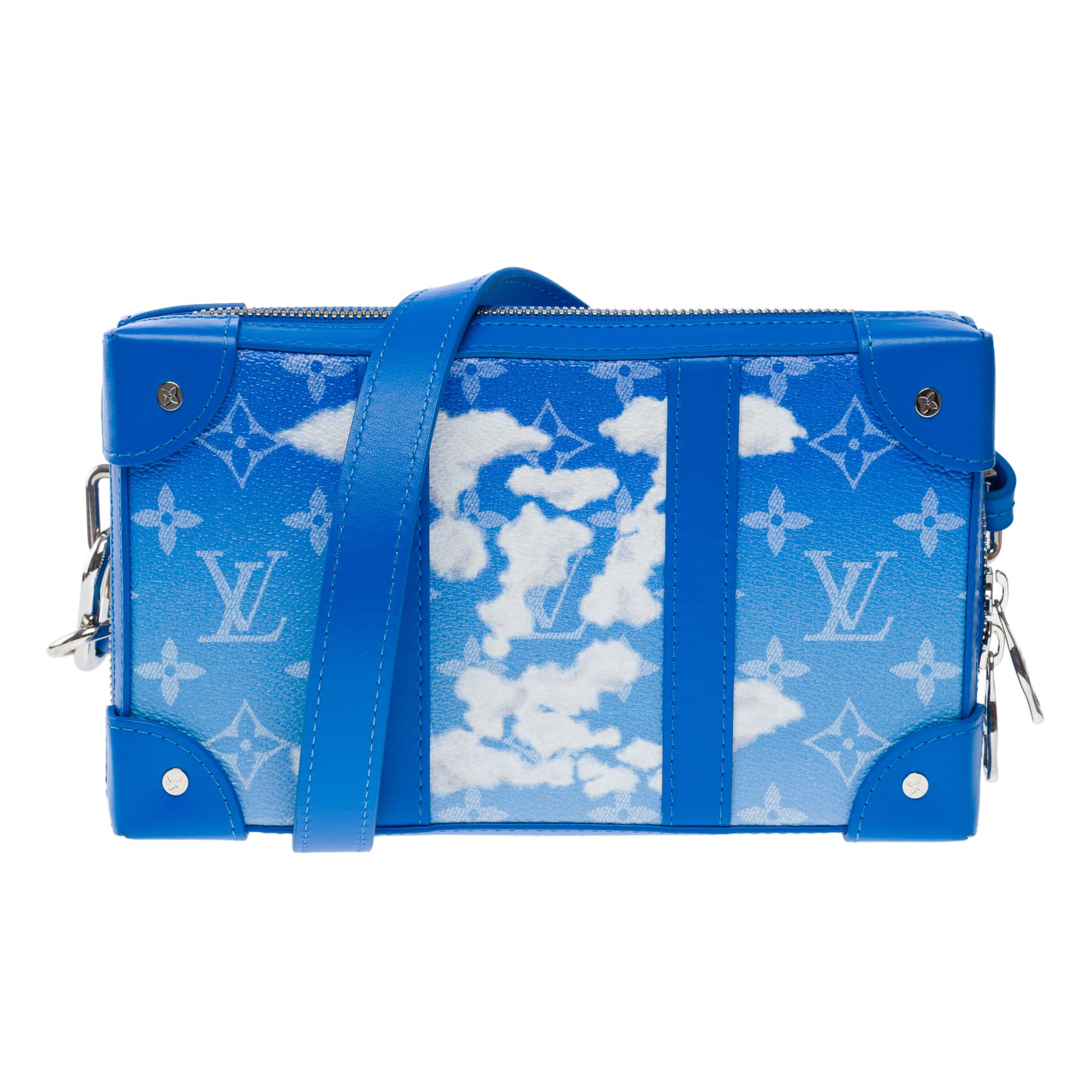 Limited​ ​edition​ ​Clouds​ ​(Fall-Winter​ ​2020​ ​men’s​ ​show)​ ​Louis​ ​Vuitton​ ​Small​ ​soft​ ​Trunk​ ​shoulder​ ​bag​ ​in​ ​blue​ ​coated​ ​canvas​ ​with​ ​cloud​ ​patterns,​ ​silver​ ​metal​ ​trim,​ ​a​ ​removable​ ​adjustable​ ​strap​ ​in​