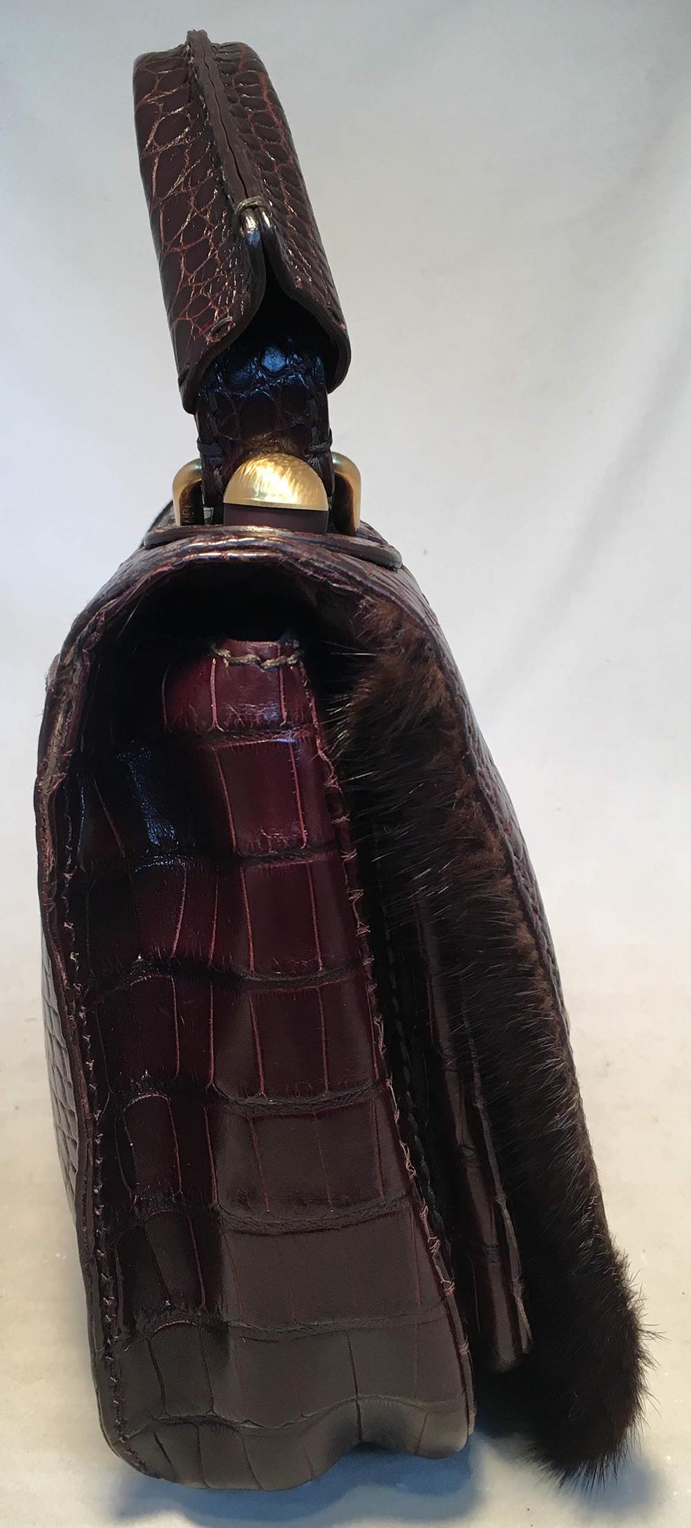 Rare Limited Edition Fendi Brown Alligator and Fur Satchel Handbag in excellent condition. Brown alligator leather exterior trimmed with brown mink fur and brushed gold hardware. Front latch flap closure opens to 2 side slit pockets and an interior