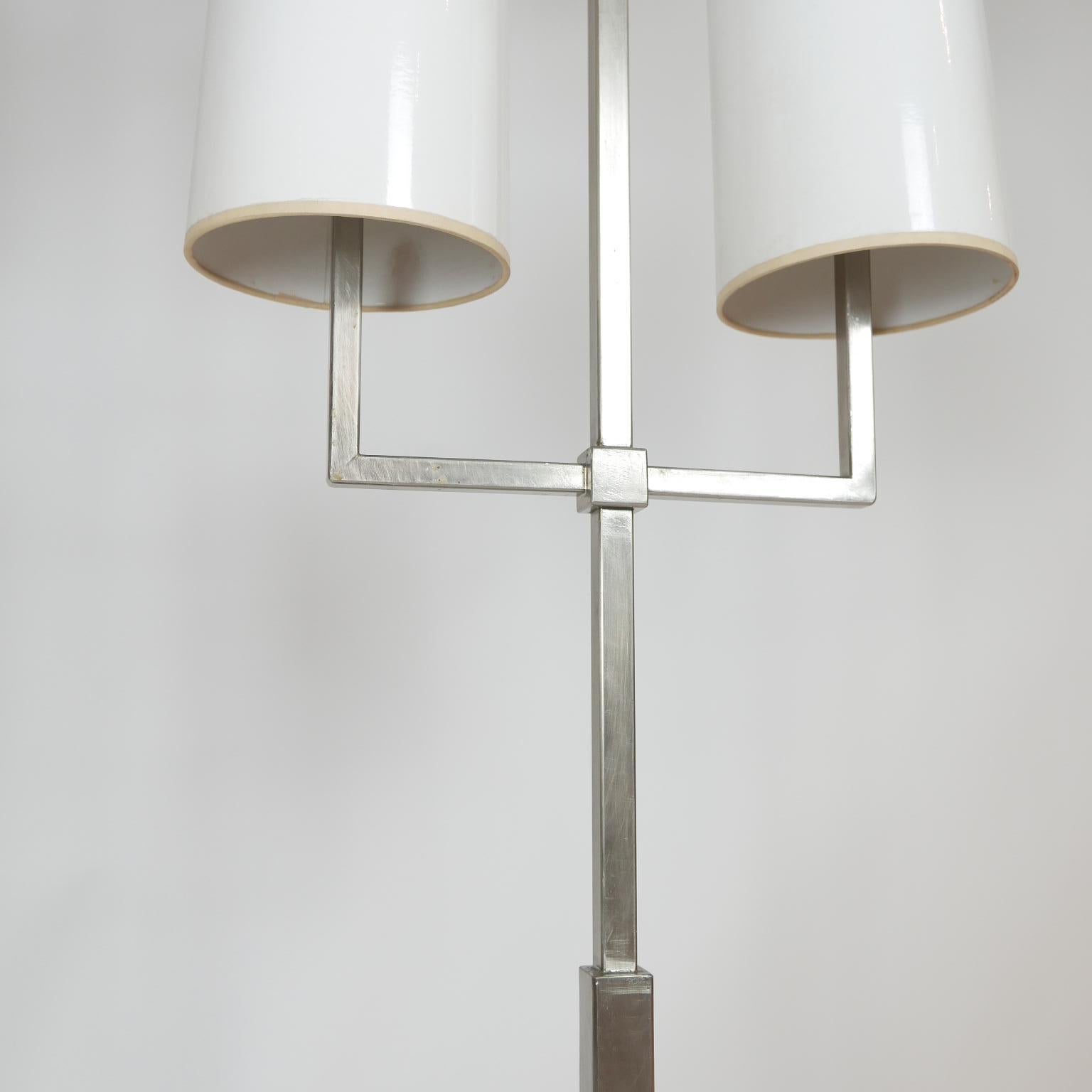 Amazing and rare Tommi Parzinger floor lamp designed exclusively for Lightolier. This is a hard to find and very practical floor lamp. Stunning in person. All original comes from original owner. Very nice vintage condition with original shades.