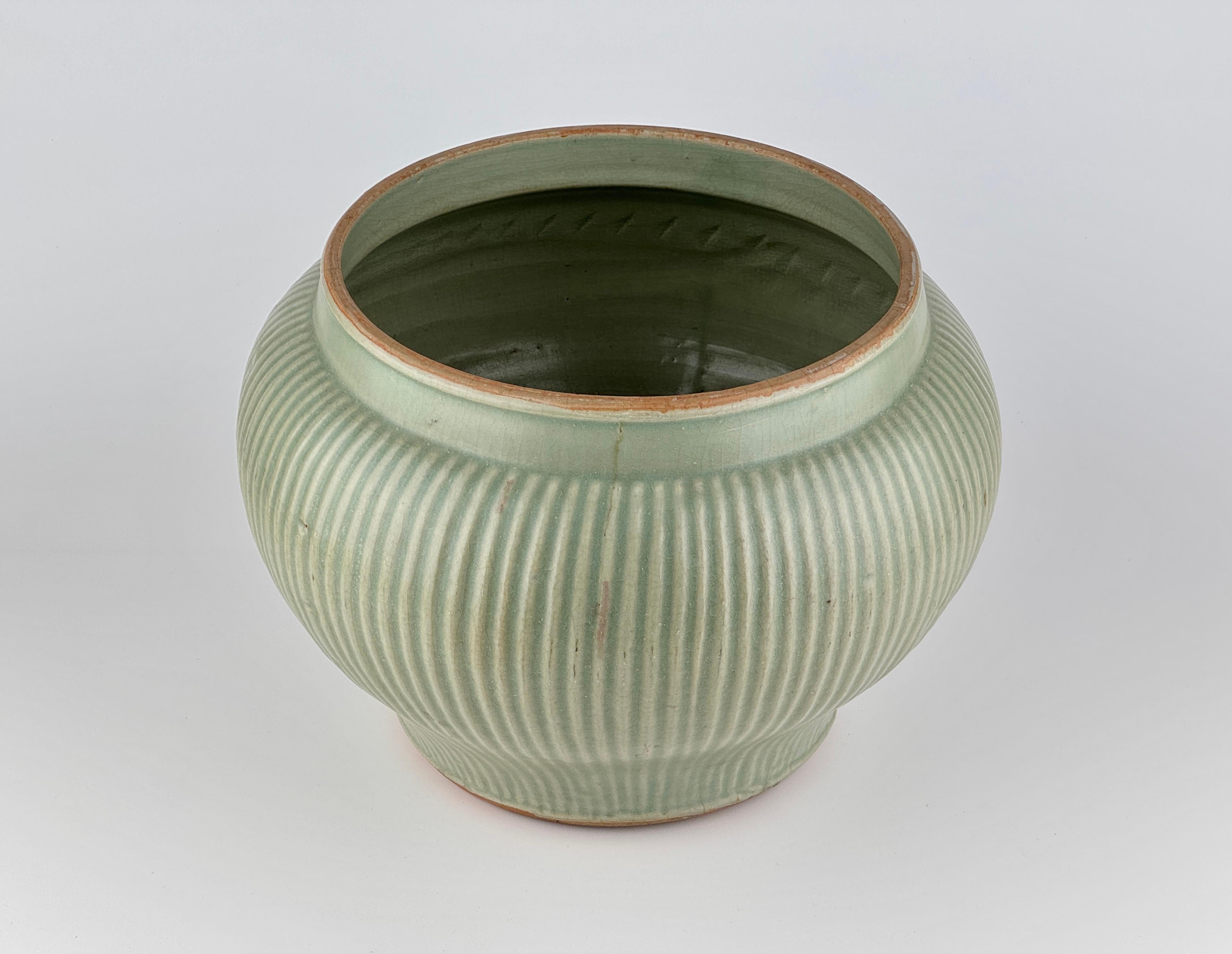 A Rare Longquan Celadon 'Hundred Rib' Jar, Song-Yuan Dynasty For Sale 4
