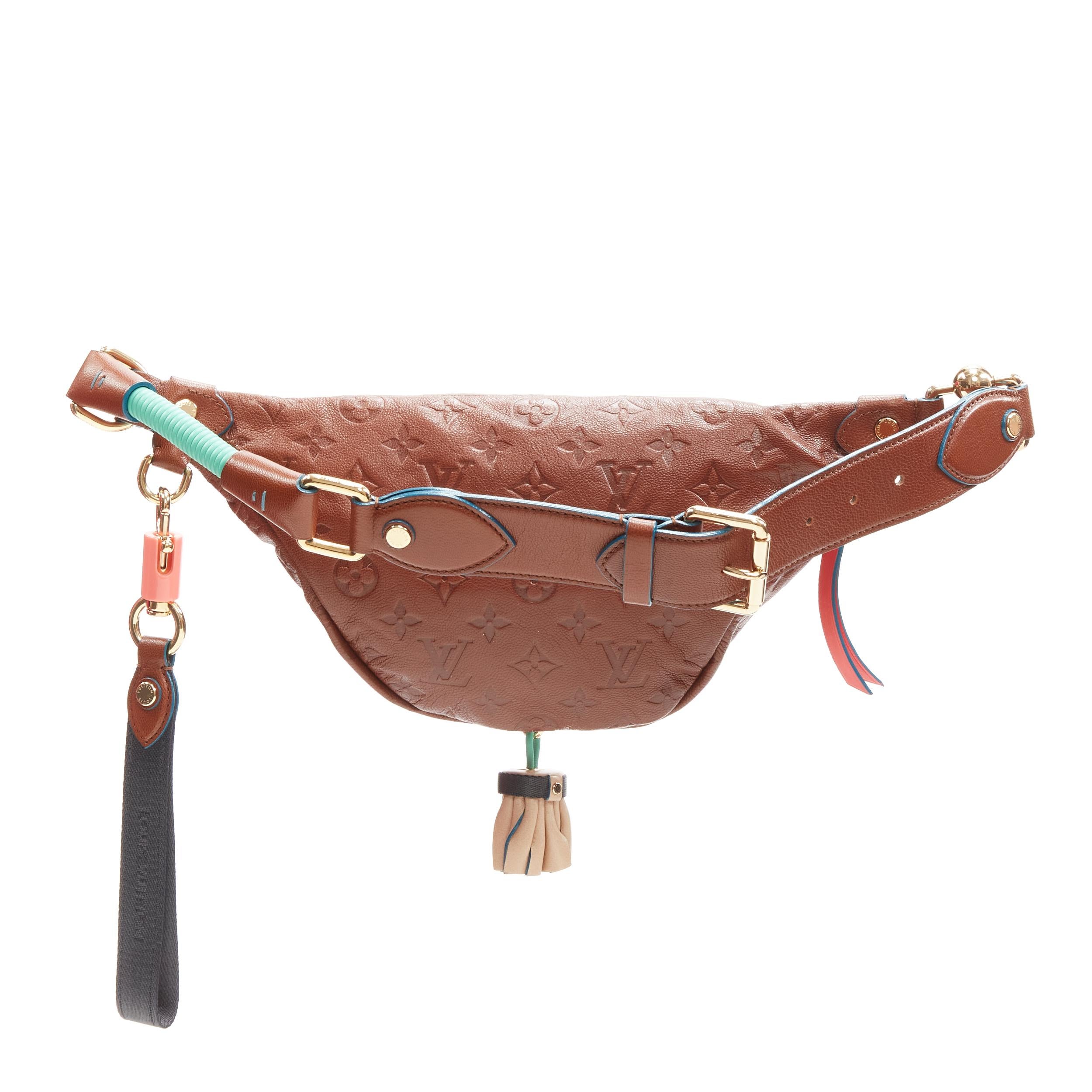 Women's rare LOUIS VUITTON 2010 Underground Punk tassel brown monogram waist bag