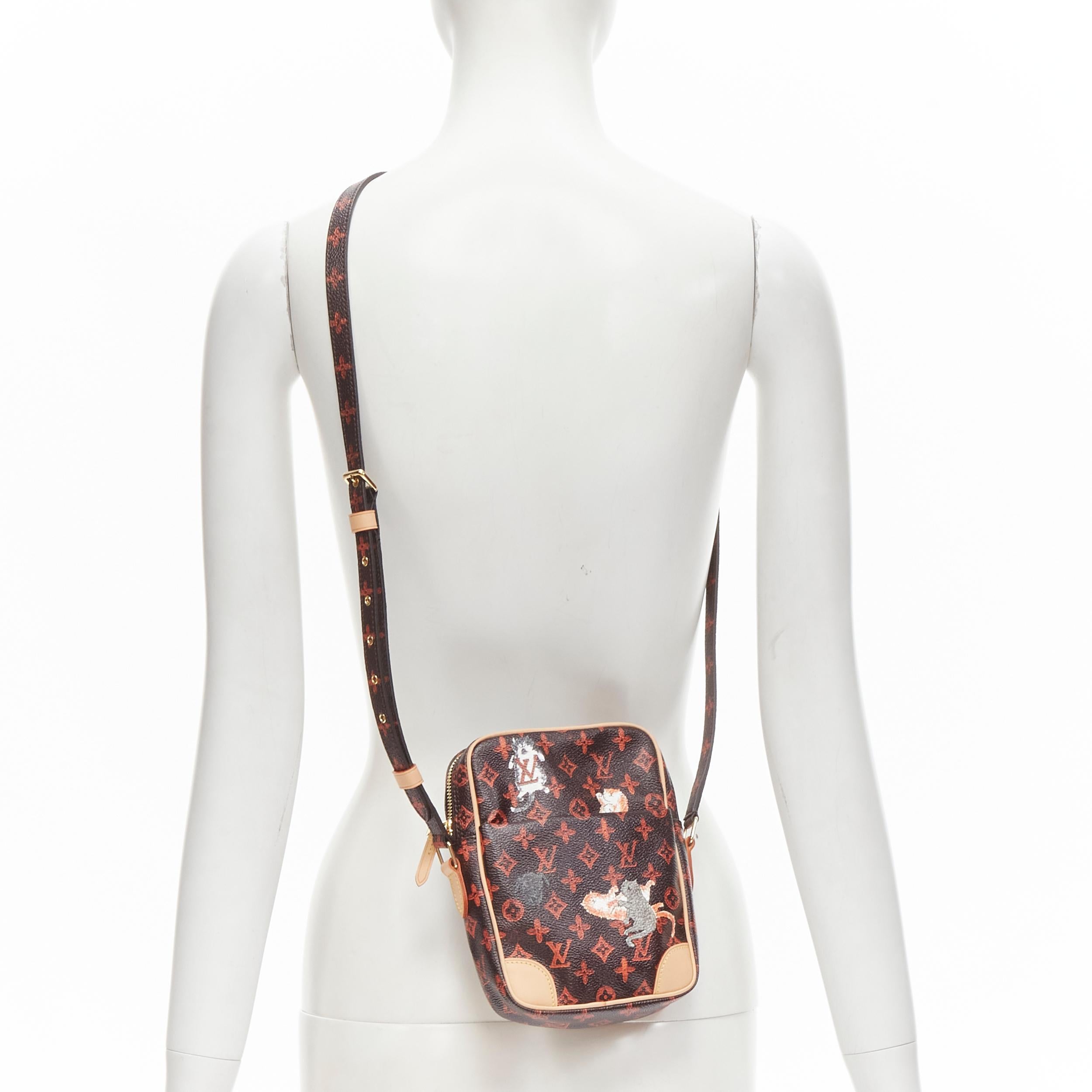 rare LOUIS VUITTON 2018 Runway Catogram Paname GM monogram crossbody camera bag 
Reference: ANWU/A00061 
Brand: Louis Vuitton 
Designer: Nicolas Ghesquiere 
Material: Canvas 
Color: Black 
Pattern: Cat 
Closure: Zip 
Extra Detail: Black and orange