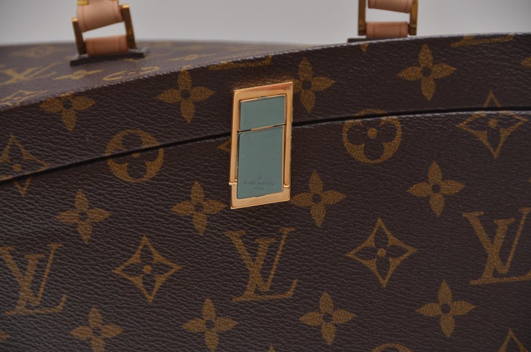 A LIMITED EDITION ICONOCLAST MONOGRAM CANVAS TWISTED BOX WITH GOLD