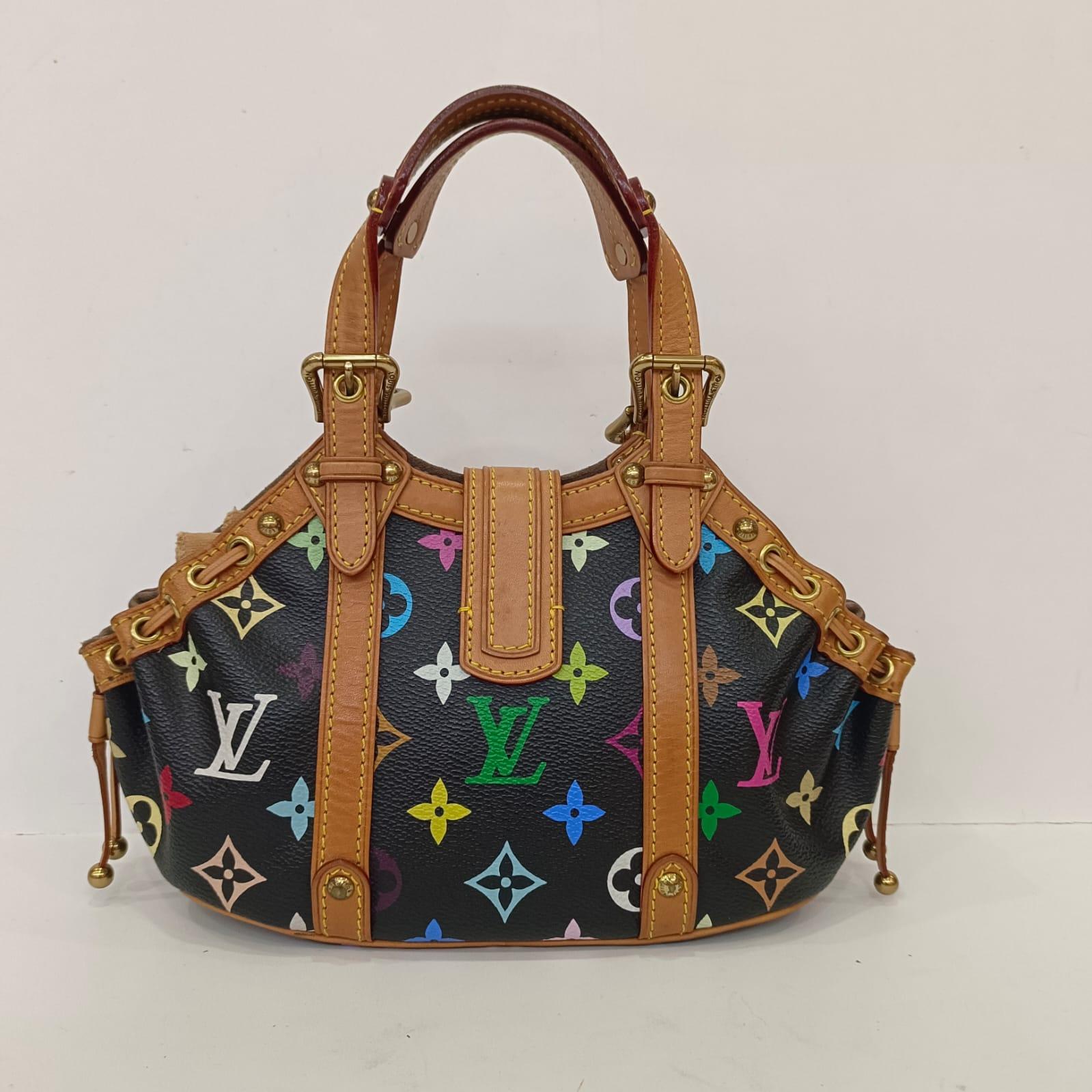 Louis Vuitton black multicolor theda in rare PM size. Very cute and perfect for multicolor collectors. Wearable for formal events too. Overall in very good condition, very minor water marks on the leather trims, but not significant. Comes with its