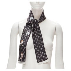 LOUIS VUITTON - Rare foulard à col bandeau en soie monogrammé noir et blanc avec monogramme