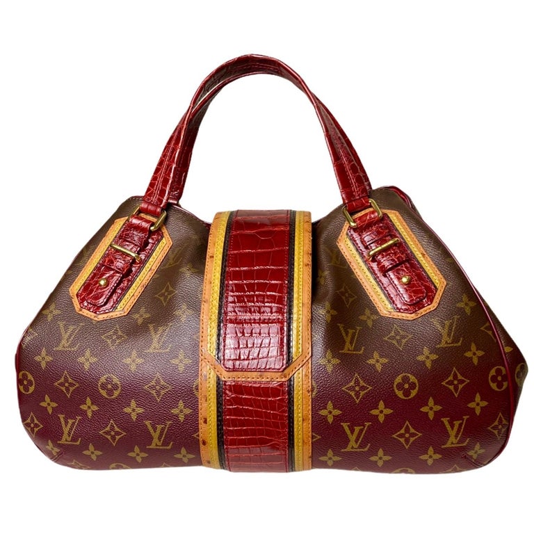 An extremely rare Louis Vuitton piece
A works of art with an extremely limited run 
Ultra-rare bag crafted in exotic Bordeaux alligator skin, mustard colored snakeskin and light brown ostrich 
Set on an LV Monogram pattern that gradually fades to