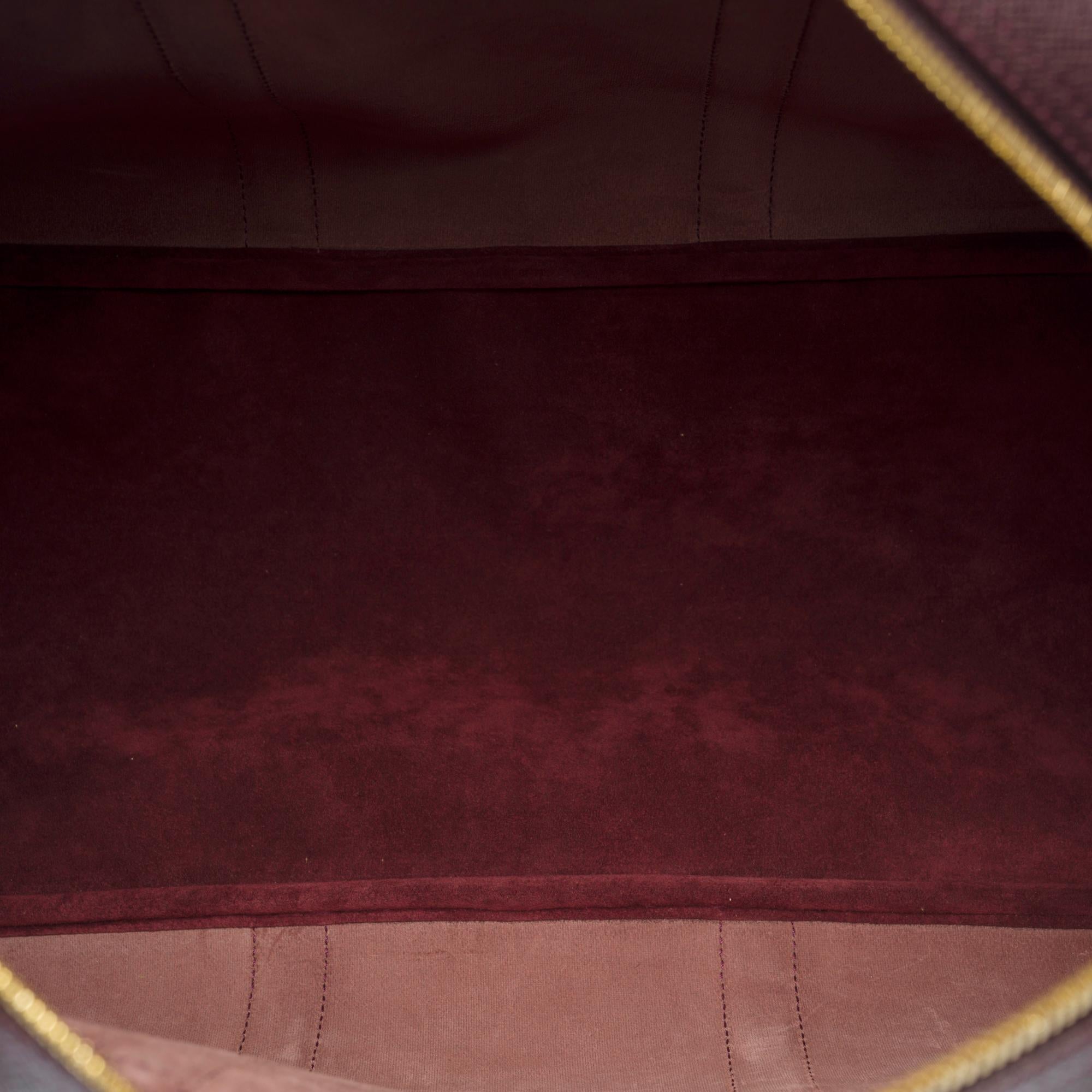 Rare Louis Vuitton Kendall strap Travel bag in Burgundy Taïga leather , GHW 1