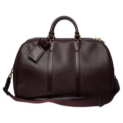 Rare Louis Vuitton Kendall strap Travel bag in Burgundy Taïga leather , GHW