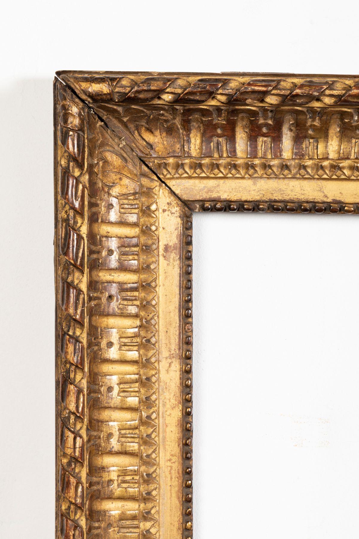 Rare Louis XVI period carved giltwood frame, mirror, France, late 18th century
Sight size: 27.5 cm x 21 cm
Overall size: 42.5 cm x 36 cm.