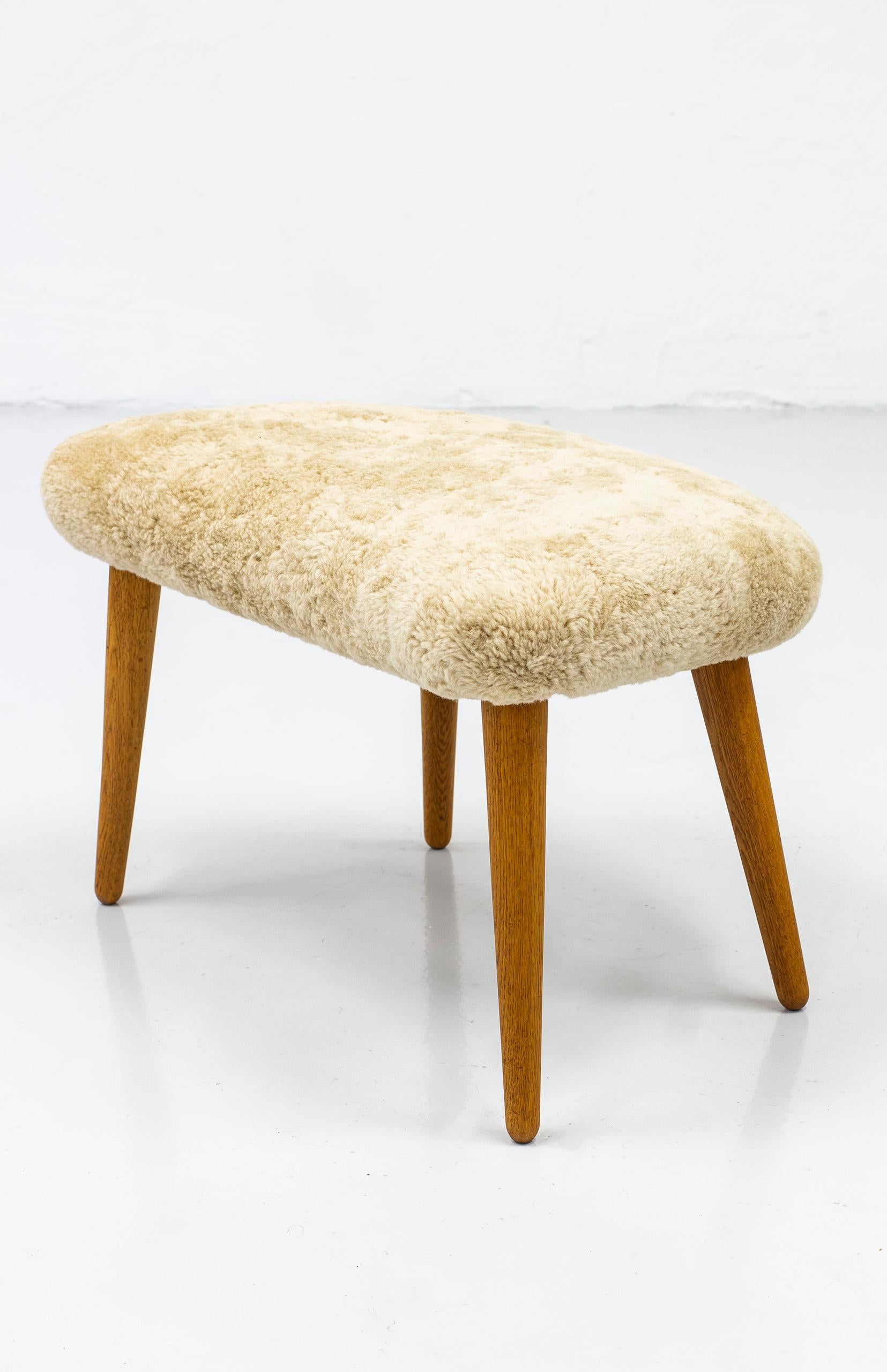 Rare Lounge Chair with Ottoman in Sheepskin by Illum Wikkelsø 2