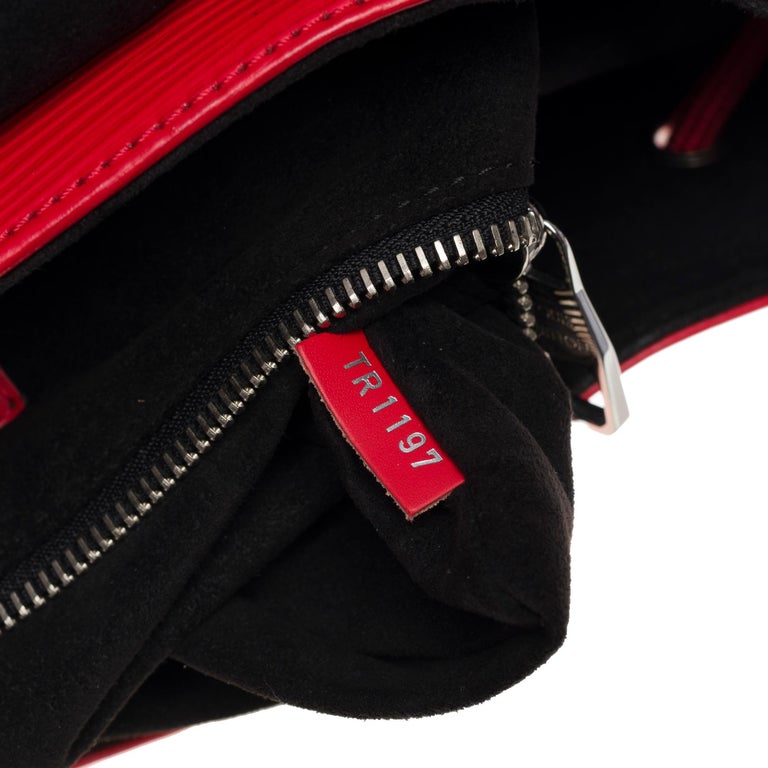 A LIMITED EDITION RED & WHITE EPI LEATHER CHRISTOPHER BACKPACK WITH SILVER  HARDWARE BY SUPREME