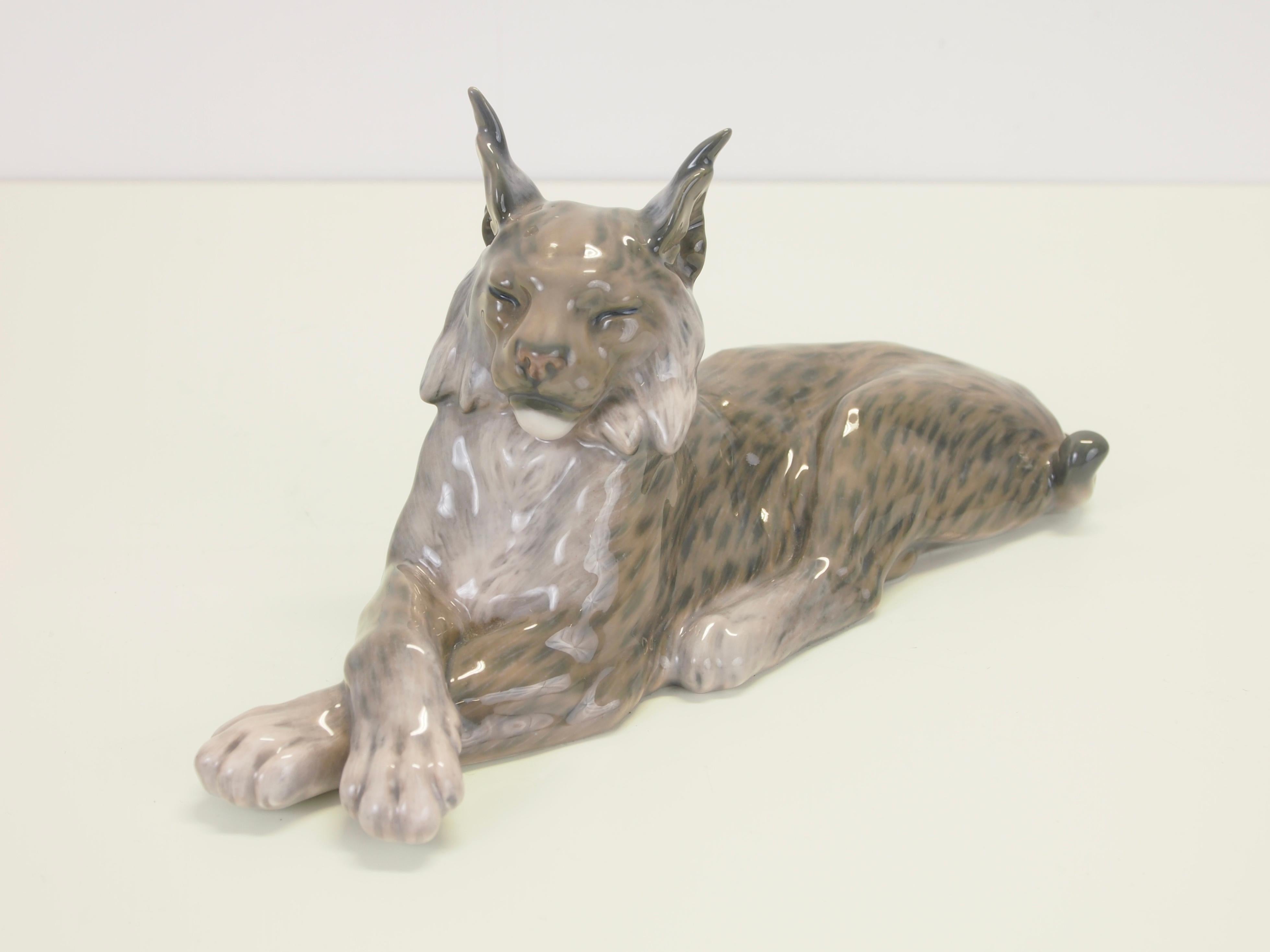 Early very rare Scandinavian porcelain figurine by Royal Copenhagen Denmark attributed to Peter Herold.

This delicate lynx porcelain figurine is very rare to find and highly collectible. 
Despite its age it's still in flawless