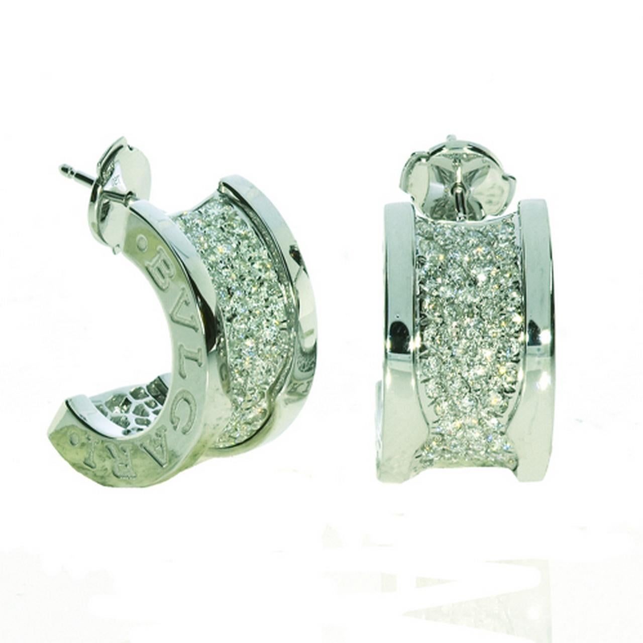 The Following Items we are offering is a Rare Important Radiant 18KT White Gold Estate Rare Magnificent Glittering Bvlgari Earrings. Earrings feature Rare Sparkling Fine Glittering Fancy White Diamonds set in 18KT Gold each with a Fancy Round Shaped