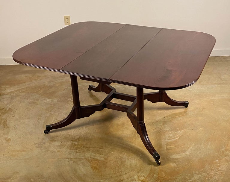 A Rare Mahogany Cumberland action
Dining Table
Possibly Duncan Phyfe workshop
18th century
Measures: 
Height 28 ½ in. Width 47 ½ in. Depth 15 ½ “Closed”
Depth 47 ½ in. by 58 in.

Provenance:
Private Collection New York
Le Trianon Fine Art &