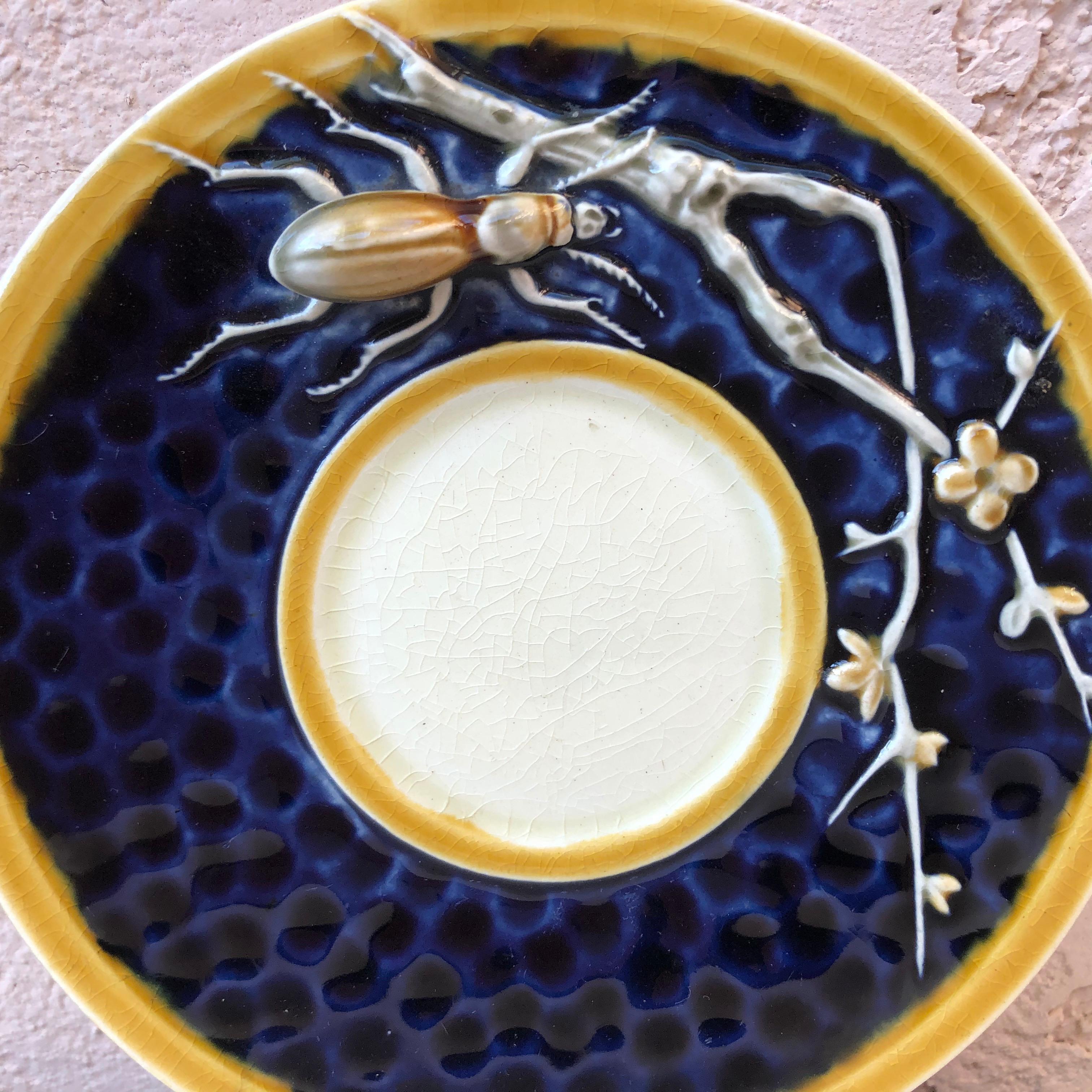 Rare majolica pin tray with insect and branches signed Choisy Le Roi, circa 1890.