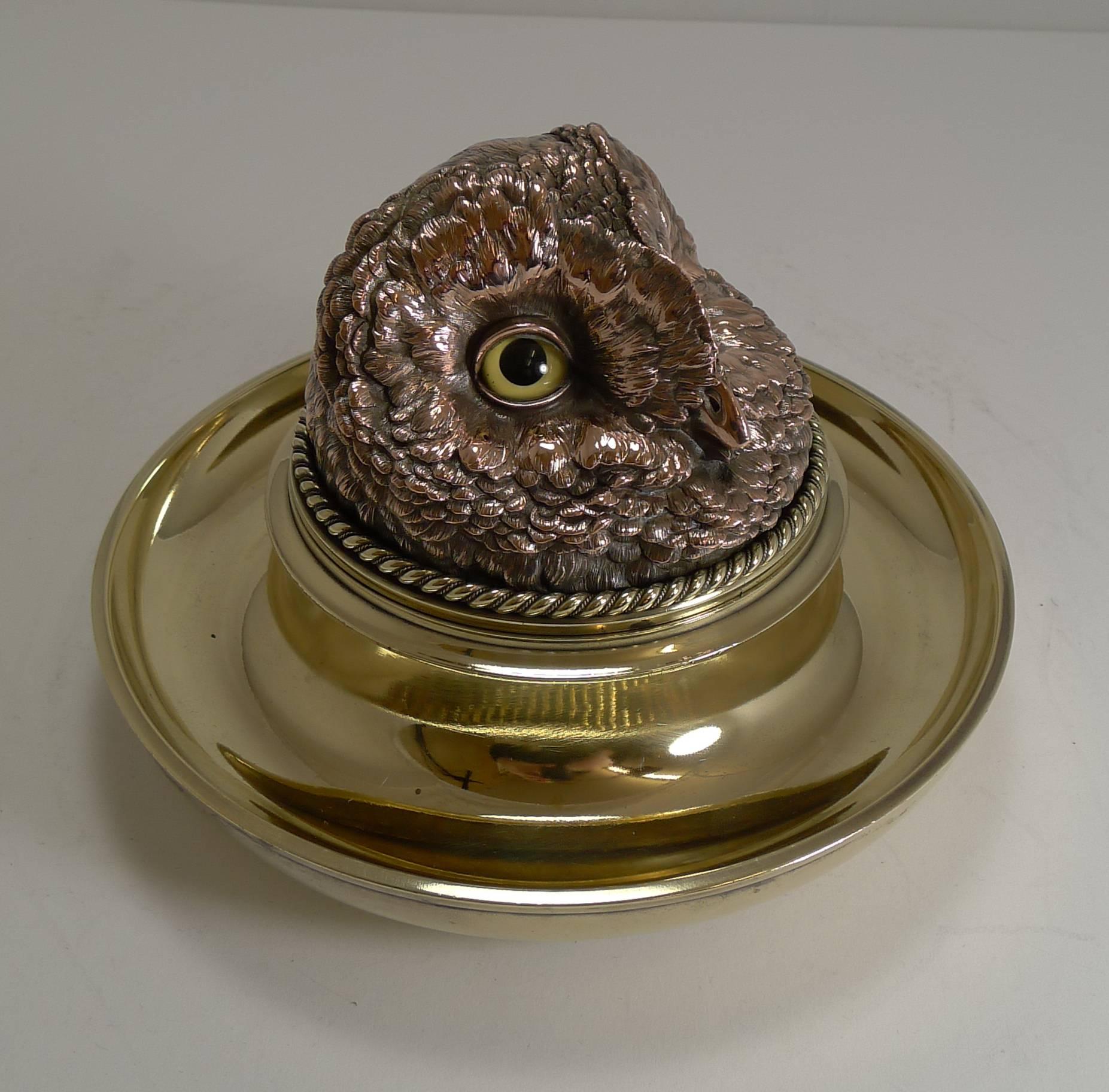 A truly outstanding and rare find, this is an outstanding Victorian figural inkwell made from a winning combination of brass and copper and retaining his wonderful two original glass eyes without damage.

The size is impressive, this is one to