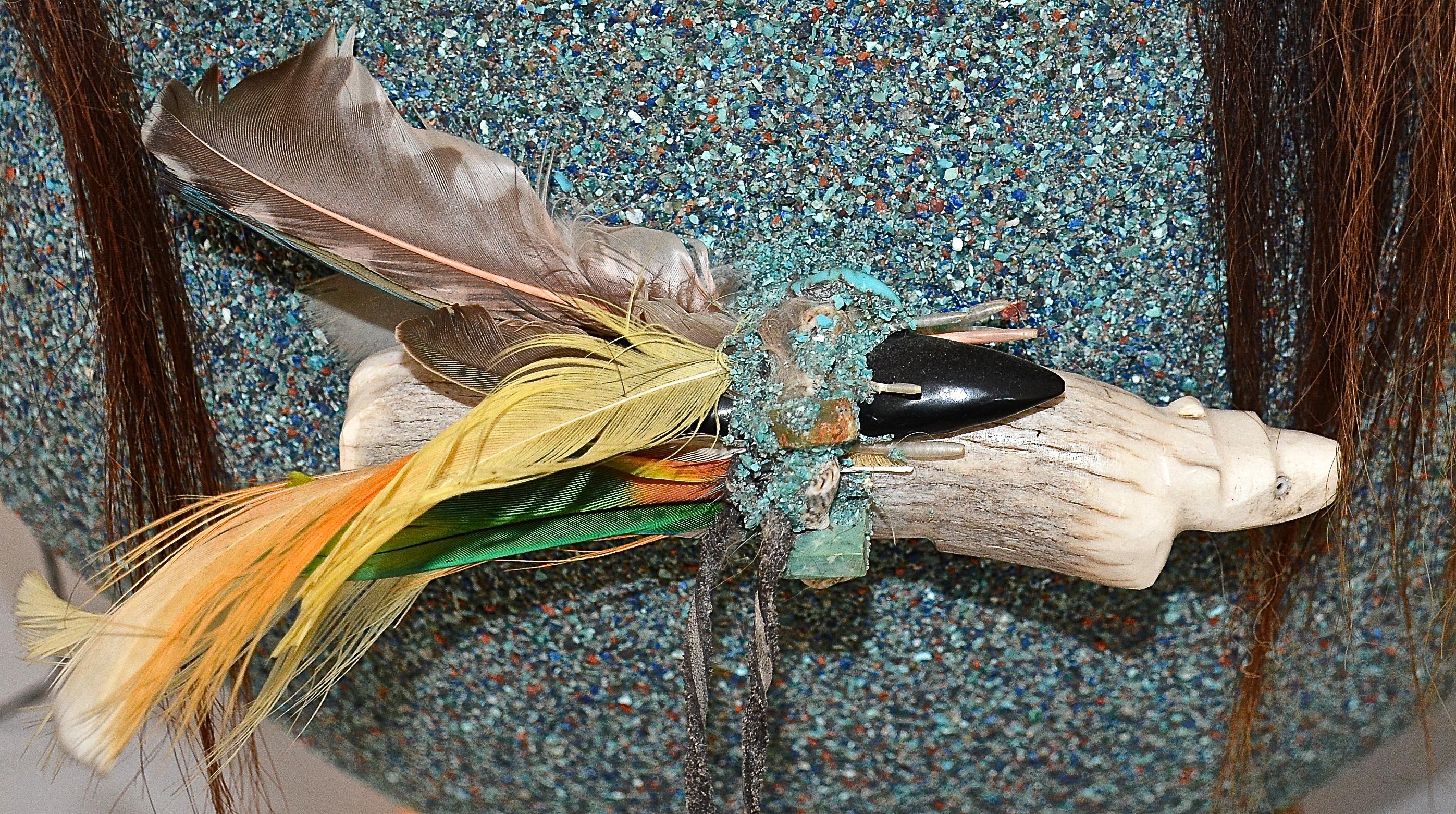 Fetish Bowl
1998
Marvelita Phillips ( 1949 - )
Ceramic pot, pine tar, turquoise, azurite, shells, coral, deer antlers, feathers, jet, horsehair, deer sinew, leather.

A truly magnificent Fetish Bowl appearing in near pristine original condition