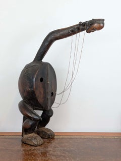 Rare Mangbetu Hardwood Arched Harp with Figural Finial, Congo Early 20th Century