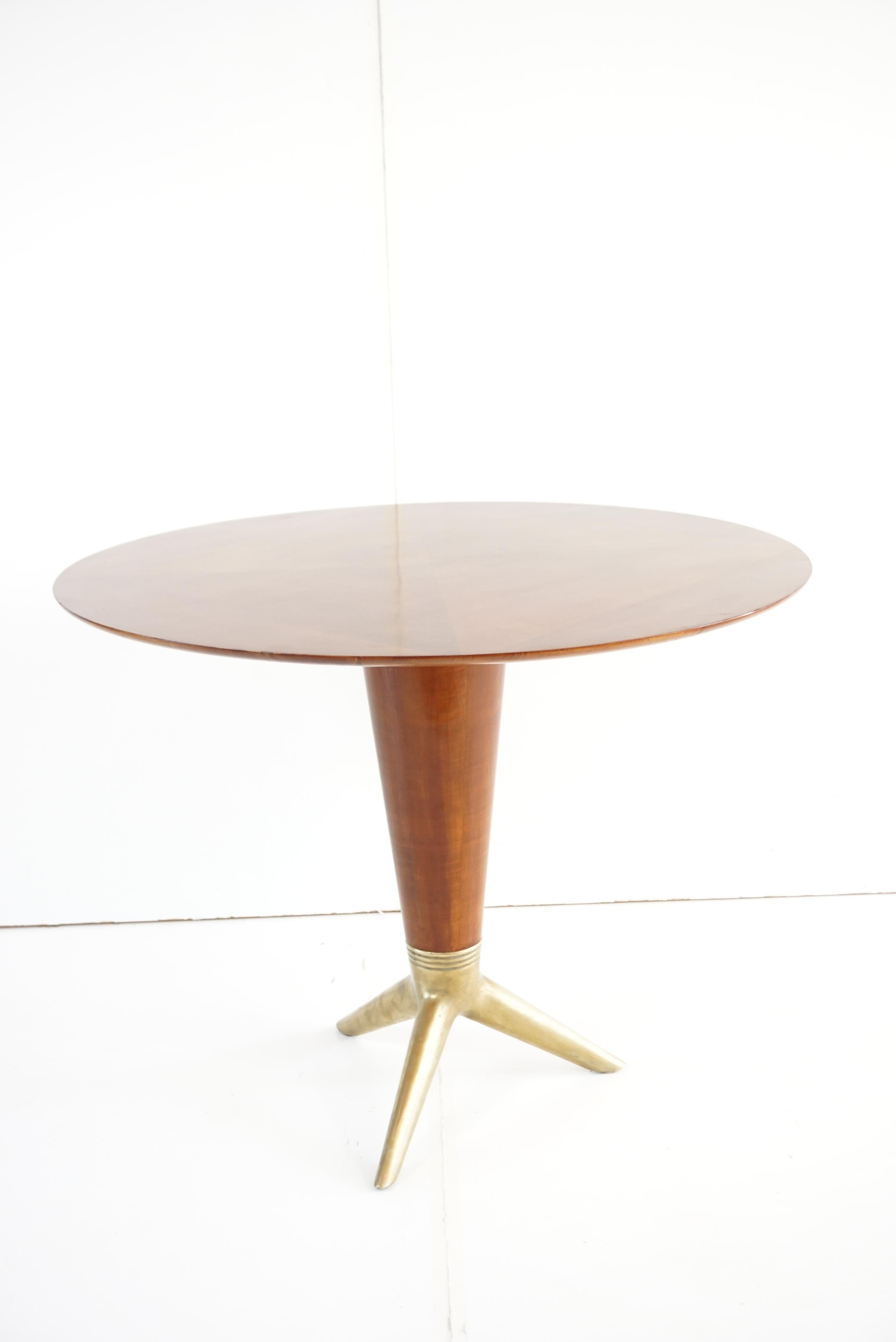 Stunning maple and brass center table.
previously thought to be designed by Gio Ponti the table is manufactured by I.S.A Bergamo . ISA produced many famous pieces designed by some of the best architect and designers of the period such as Gottardi,